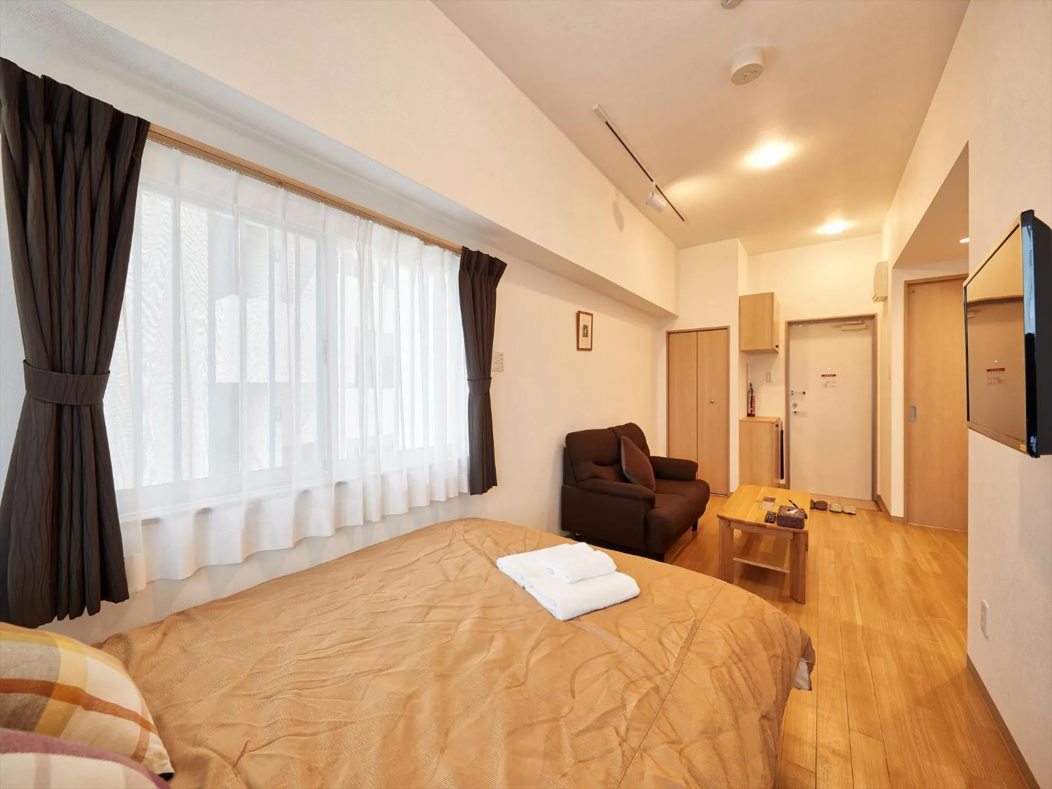 Photo of the whole room, Bed in M´s Stay Okinawa