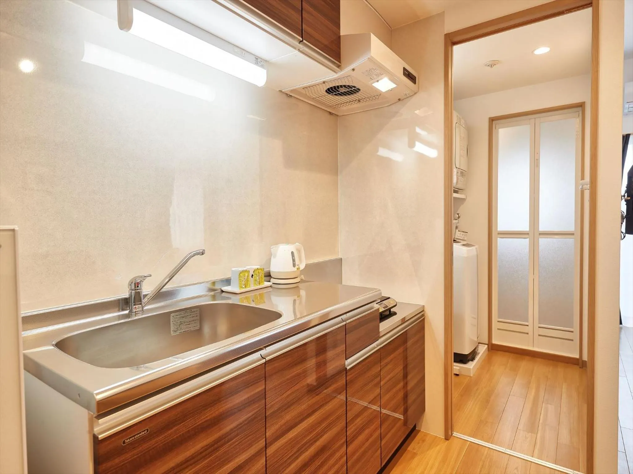 Kitchen or kitchenette in M´s Stay Okinawa