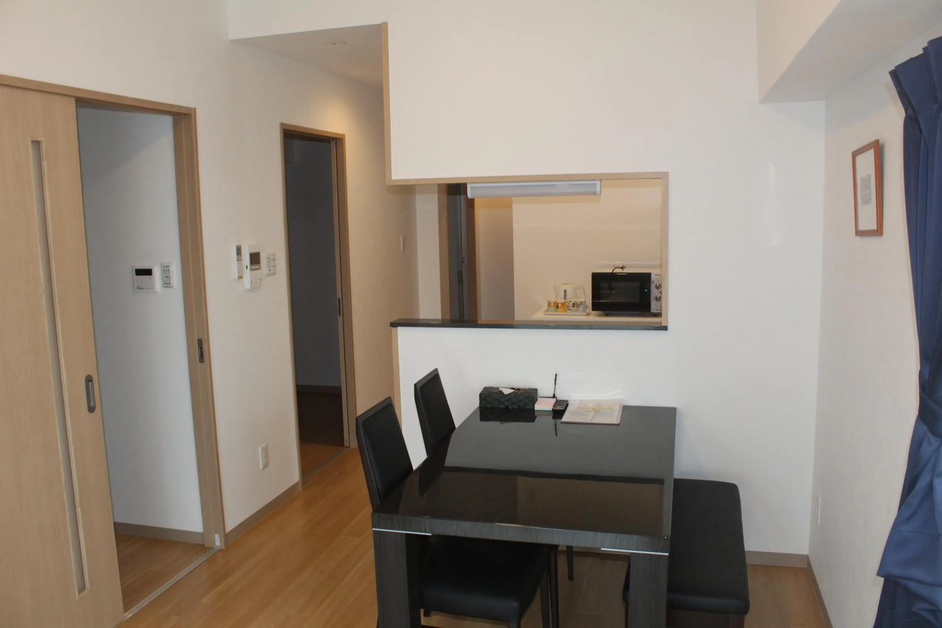 Kitchen or kitchenette in M´s Stay Okinawa