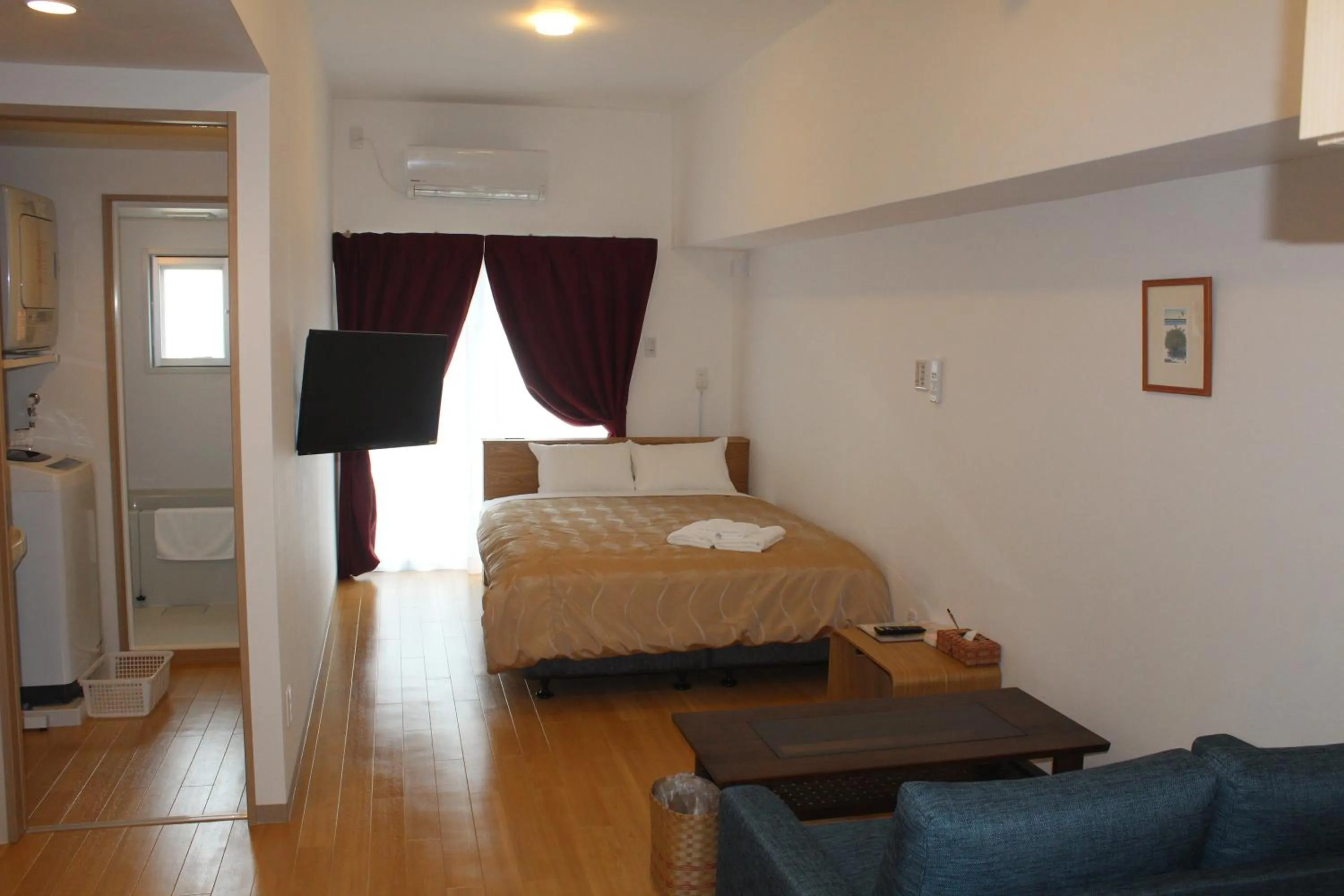 Photo of the whole room, Bed in M´s Stay Okinawa