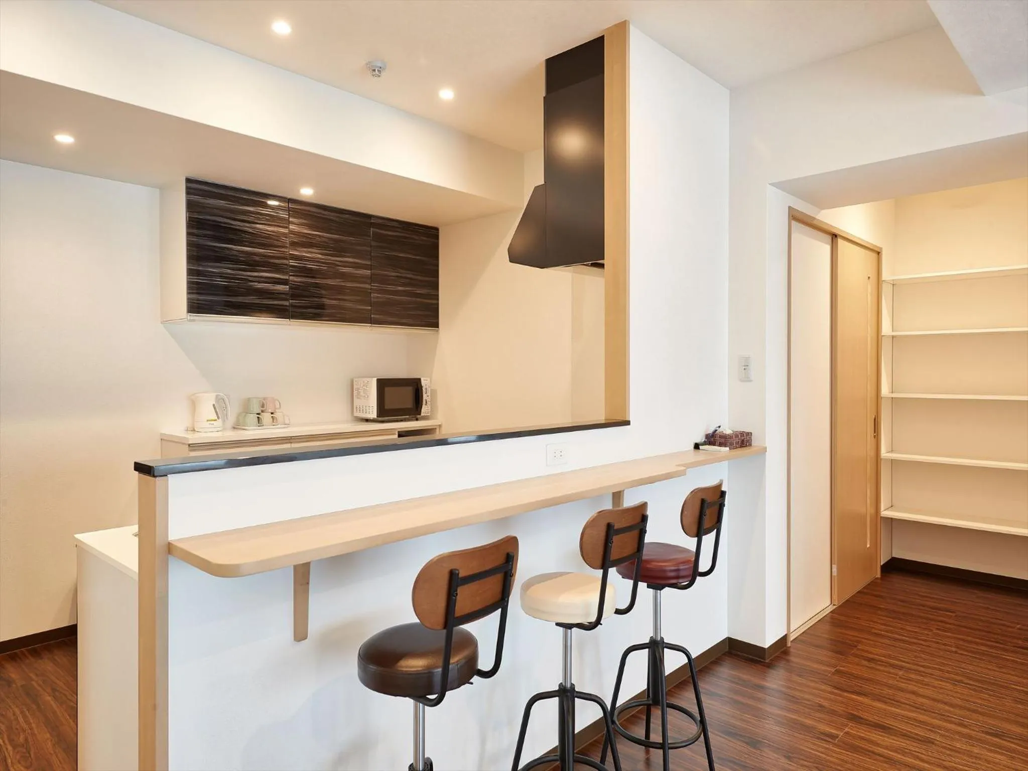 Kitchen or kitchenette in M´s Stay Okinawa