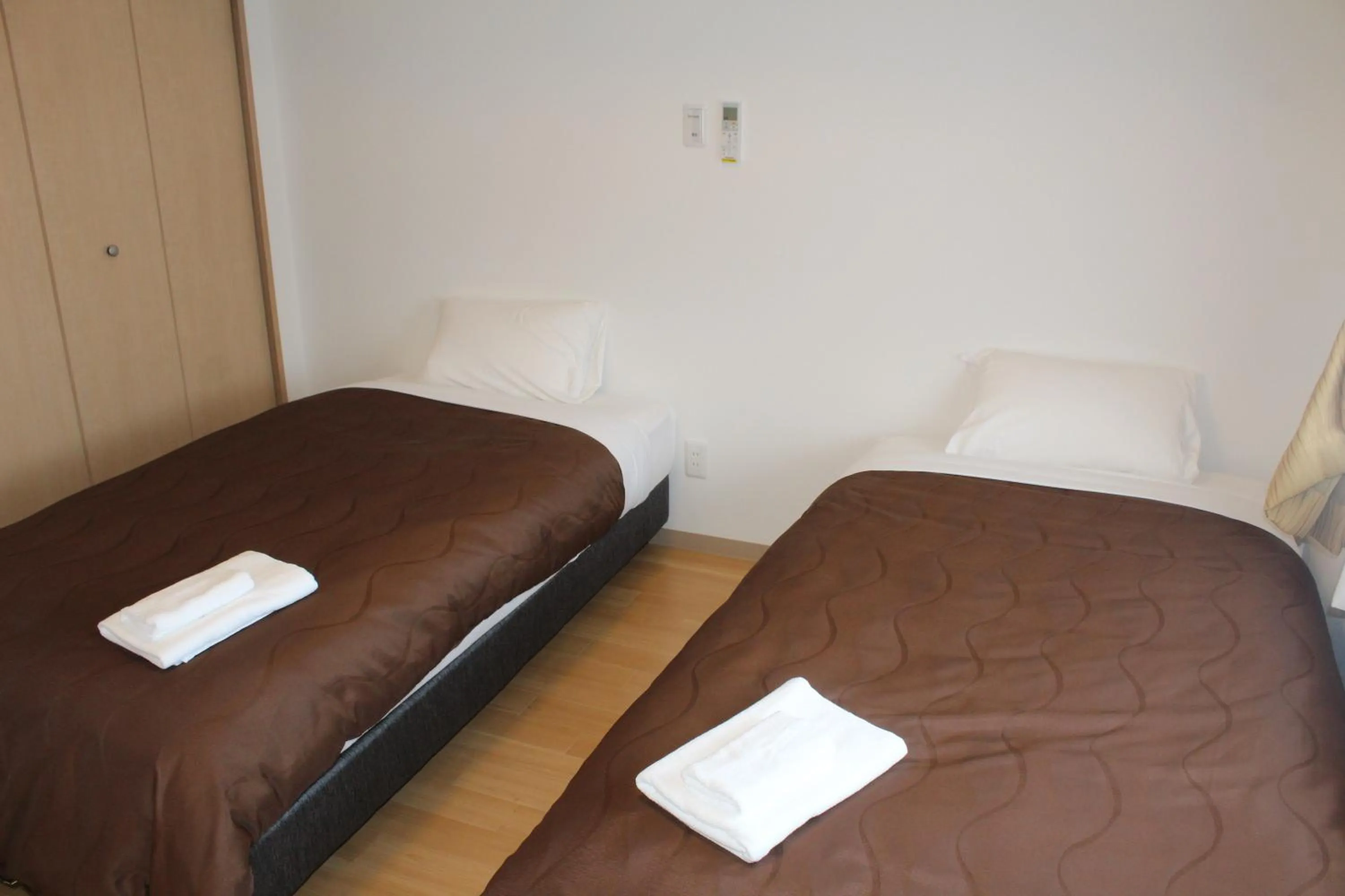 Bed in M´s Stay Okinawa