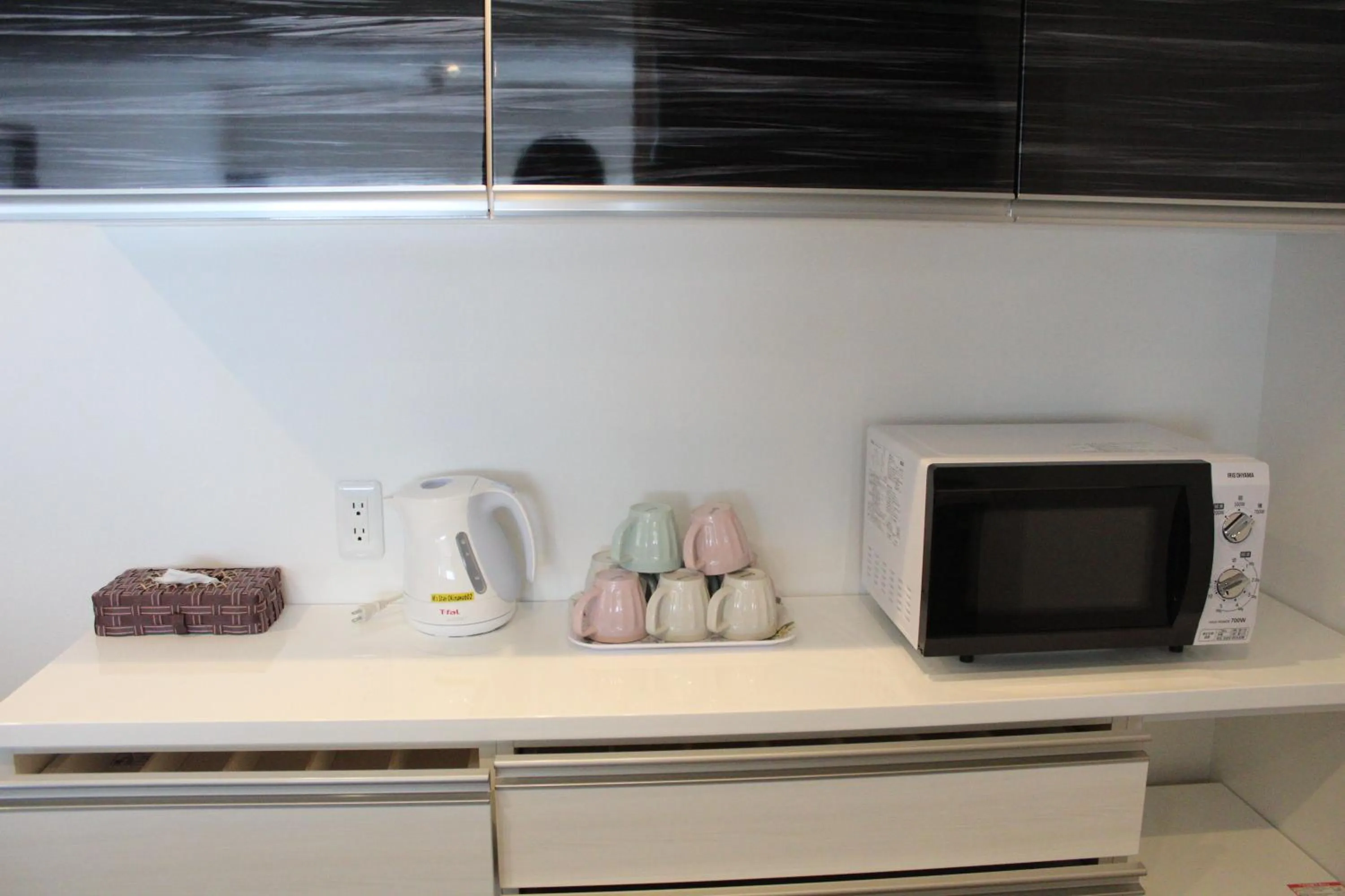 Kitchen or kitchenette in M´s Stay Okinawa