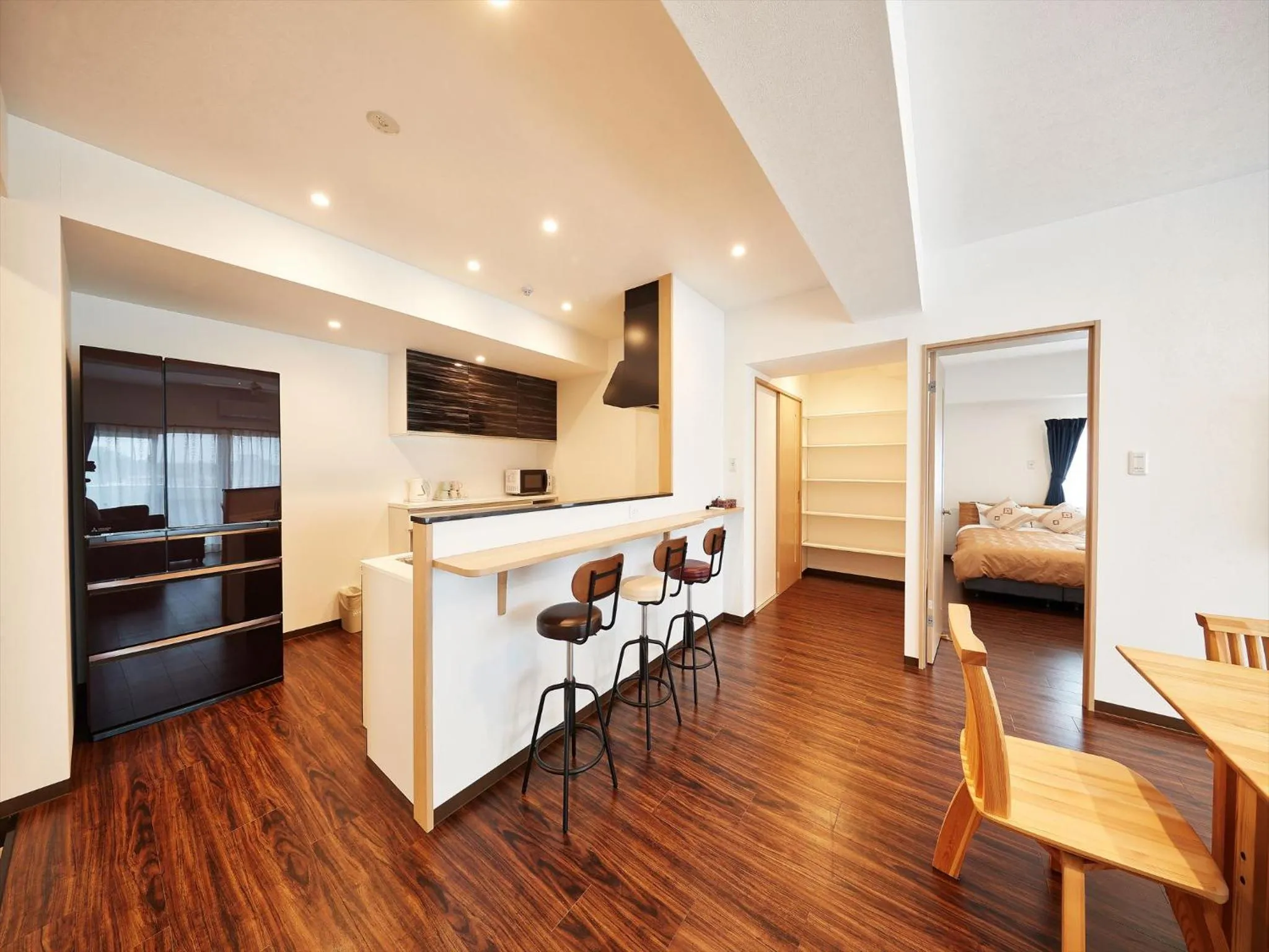 Photo of the whole room, Bed in M´s Stay Okinawa