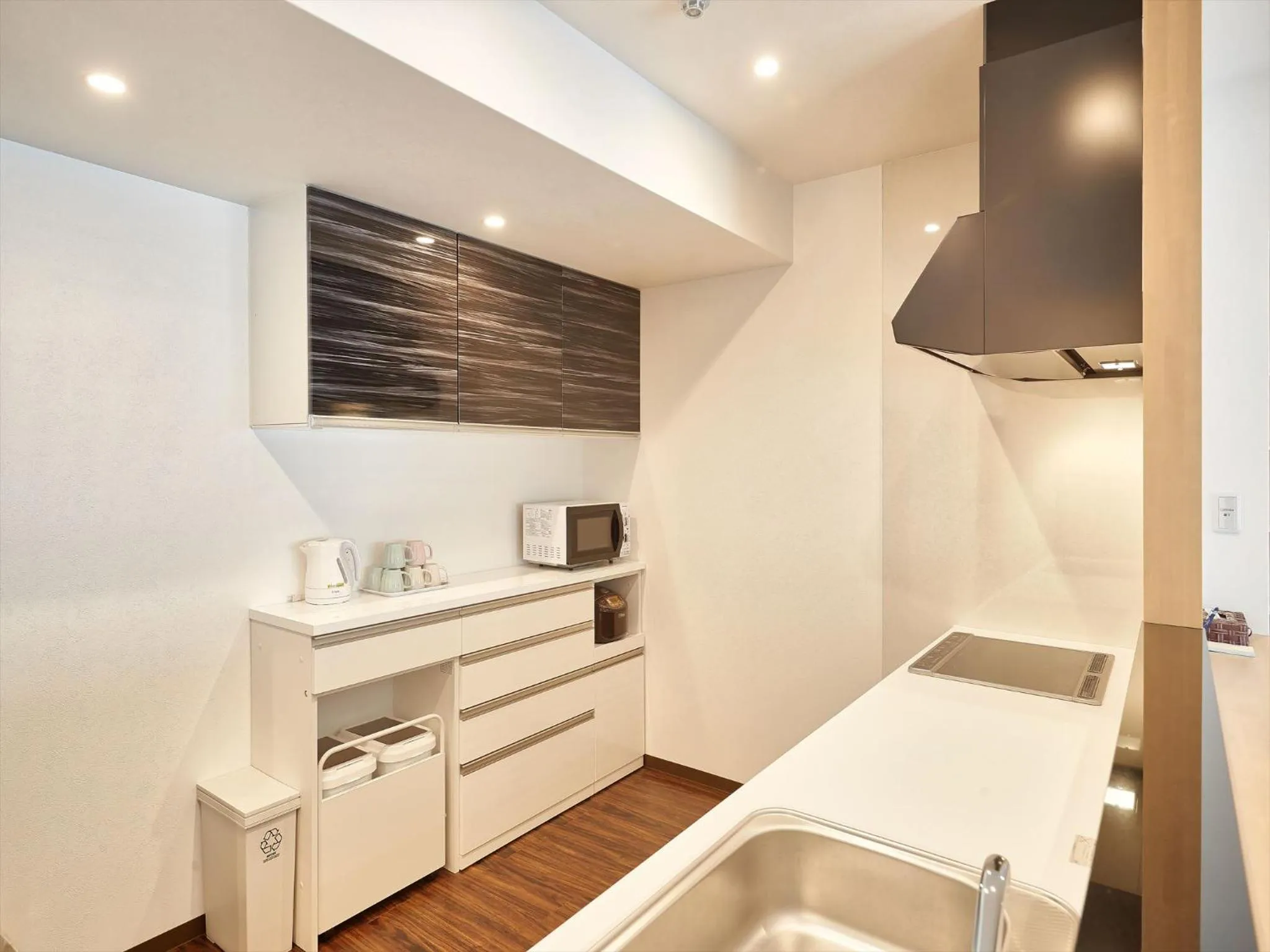 Kitchen or kitchenette in M´s Stay Okinawa