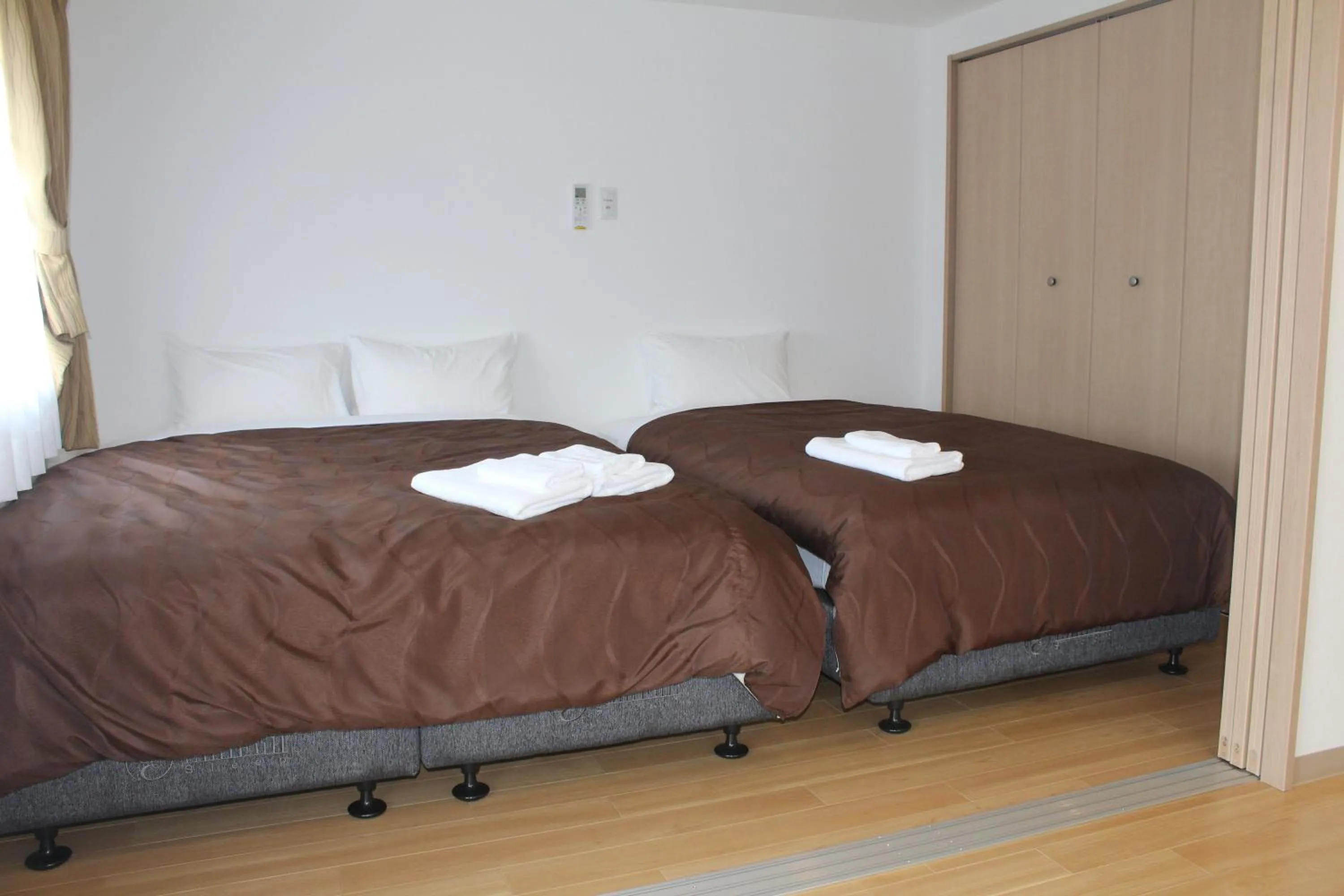 Bed in M´s Stay Okinawa