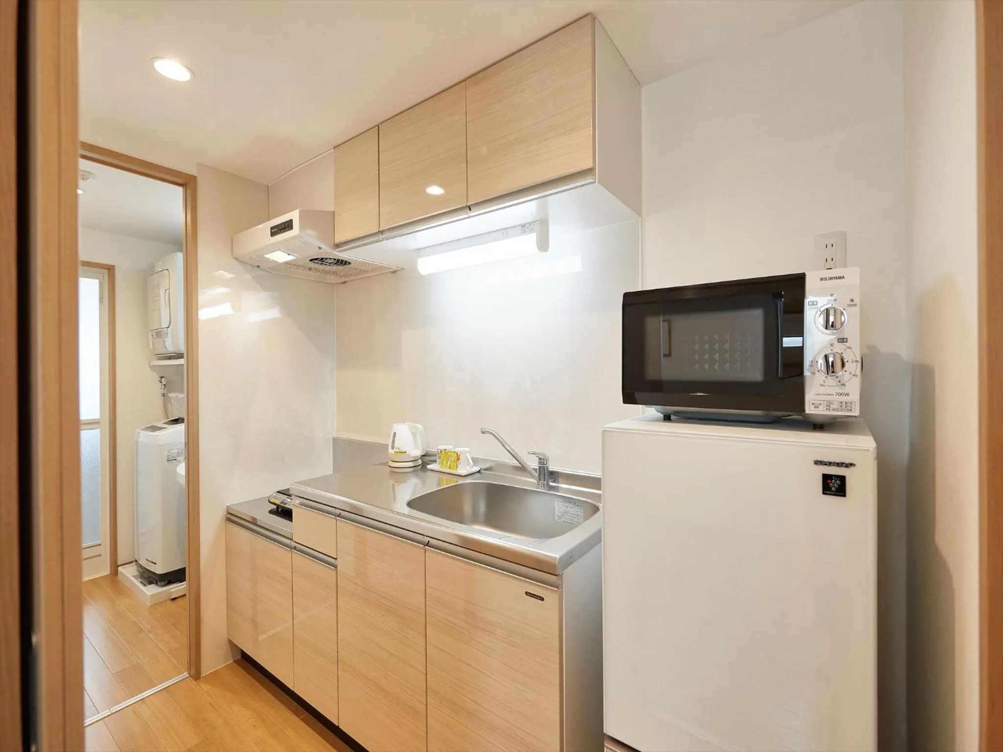 Kitchen or kitchenette in M´s Stay Okinawa