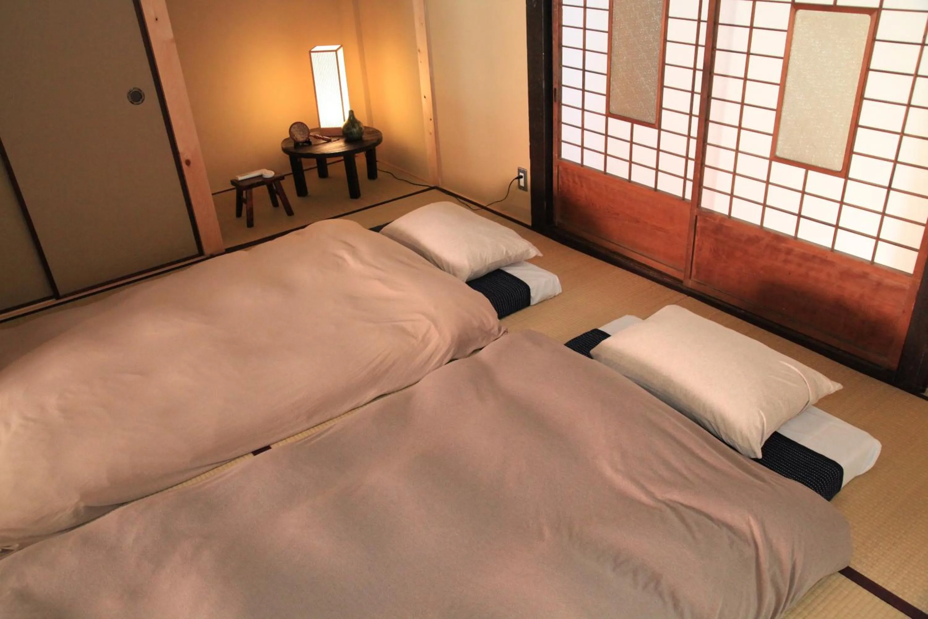 Bed in Temari Inn Oitoma