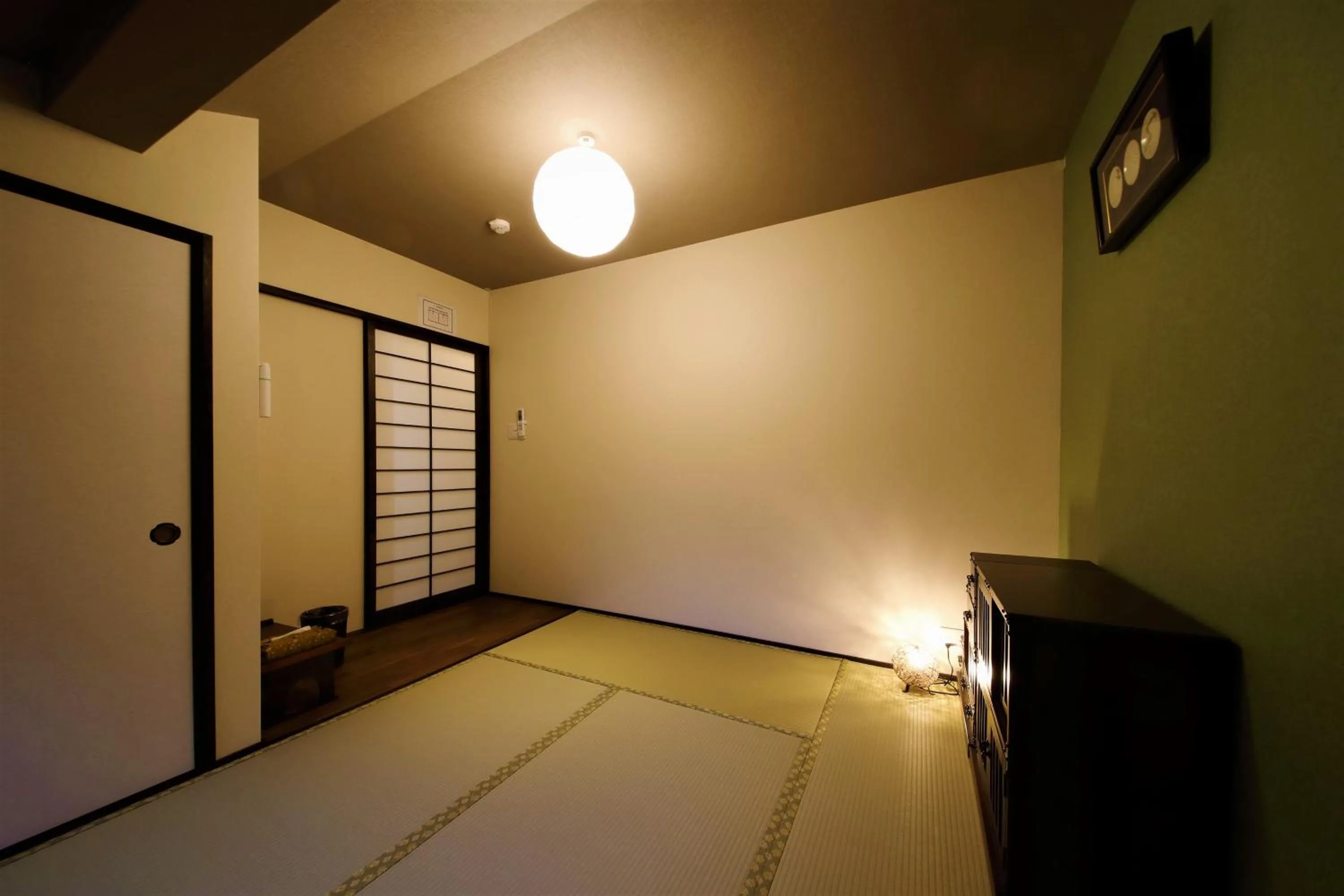 Property building, Bed in Guest House Nishijin Yui