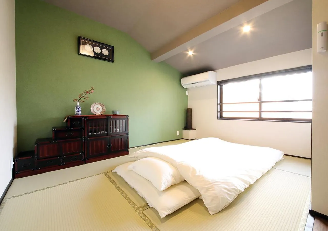 Property building, Bed in Guest House Nishijin Yui
