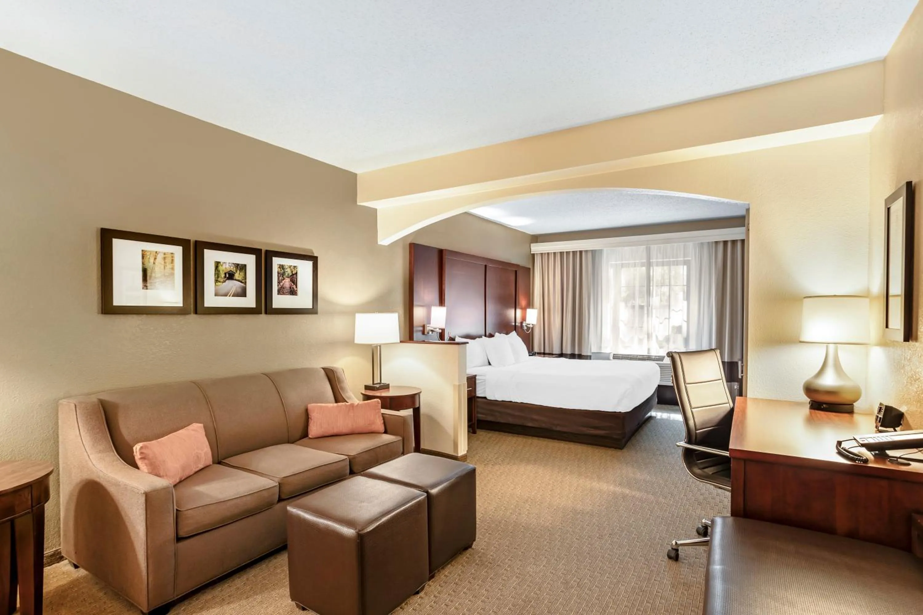 Living room, Bed in Comfort Suites State College near Penn State - Steps Away from PSU!