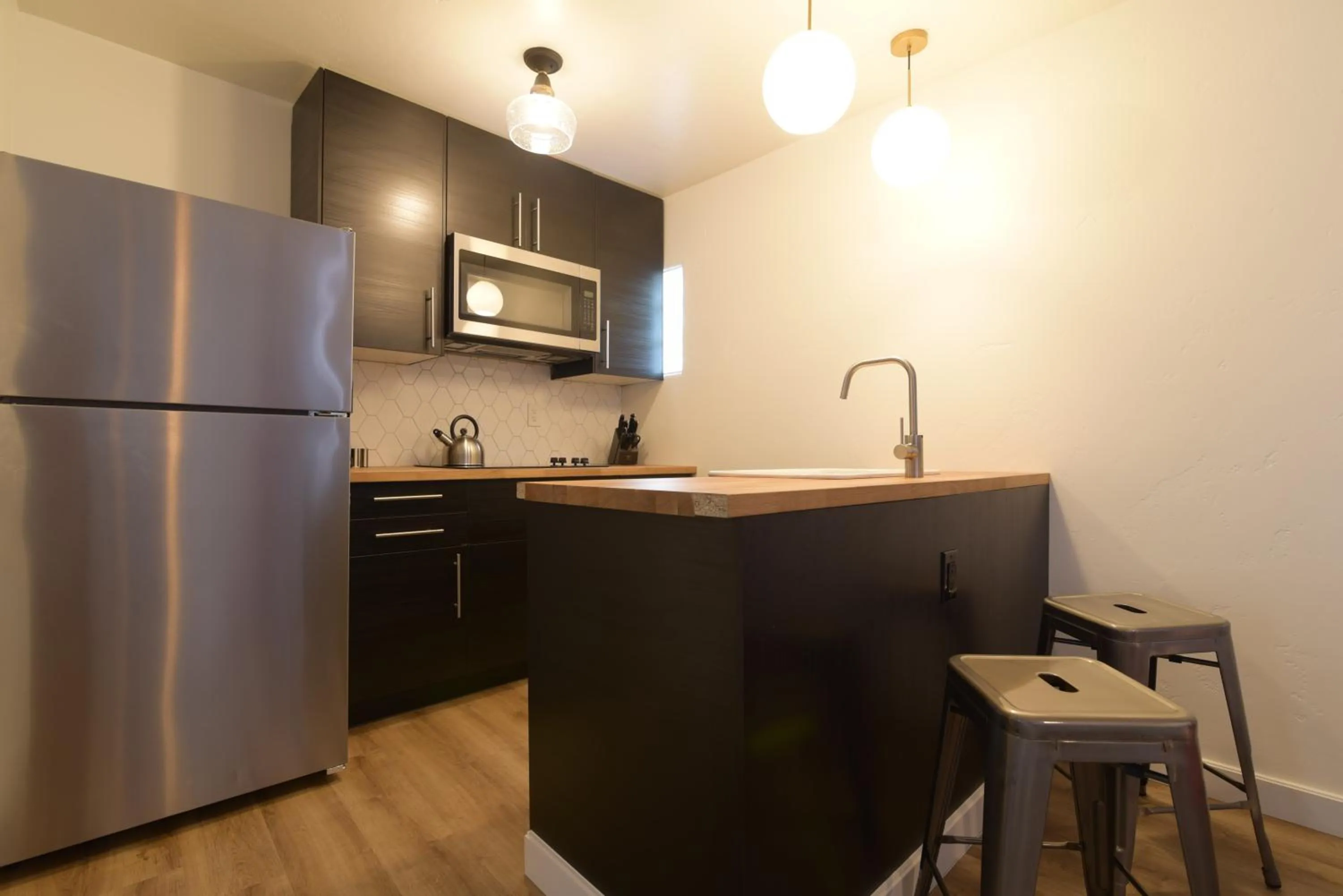 Kitchen or kitchenette in Spoke and Vine Motel