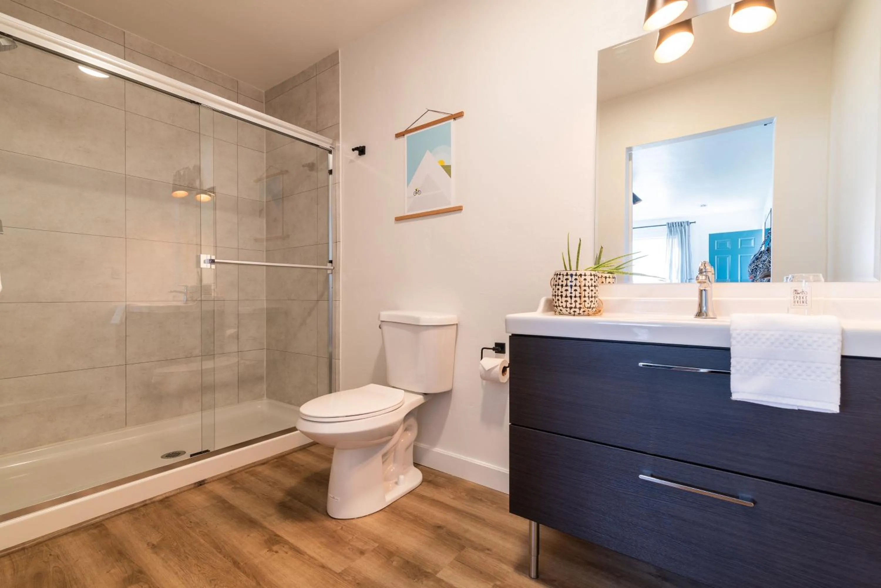 Toilet in Spoke and Vine Motel