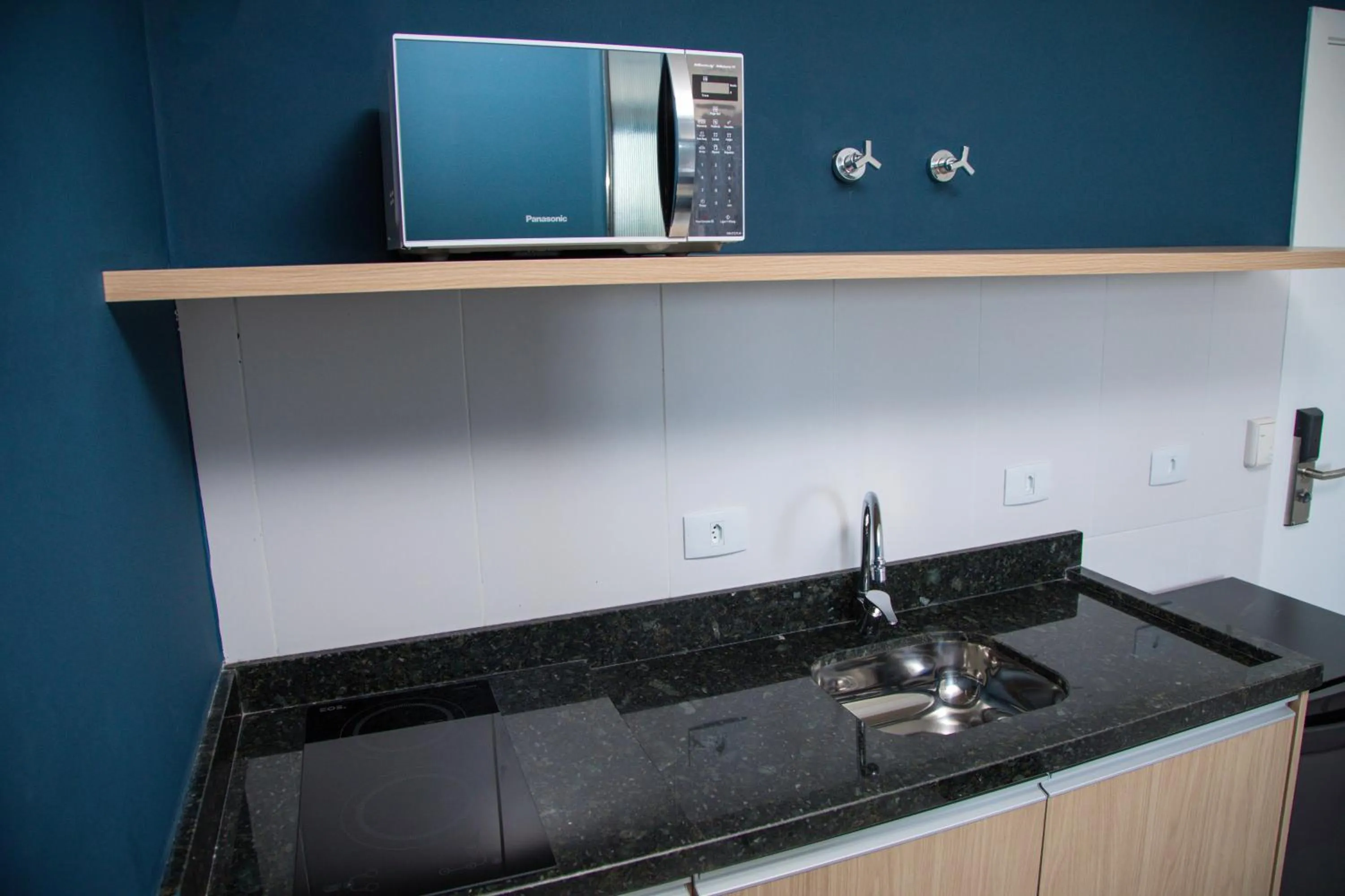 kitchen in Slim Curitiba João Bettega