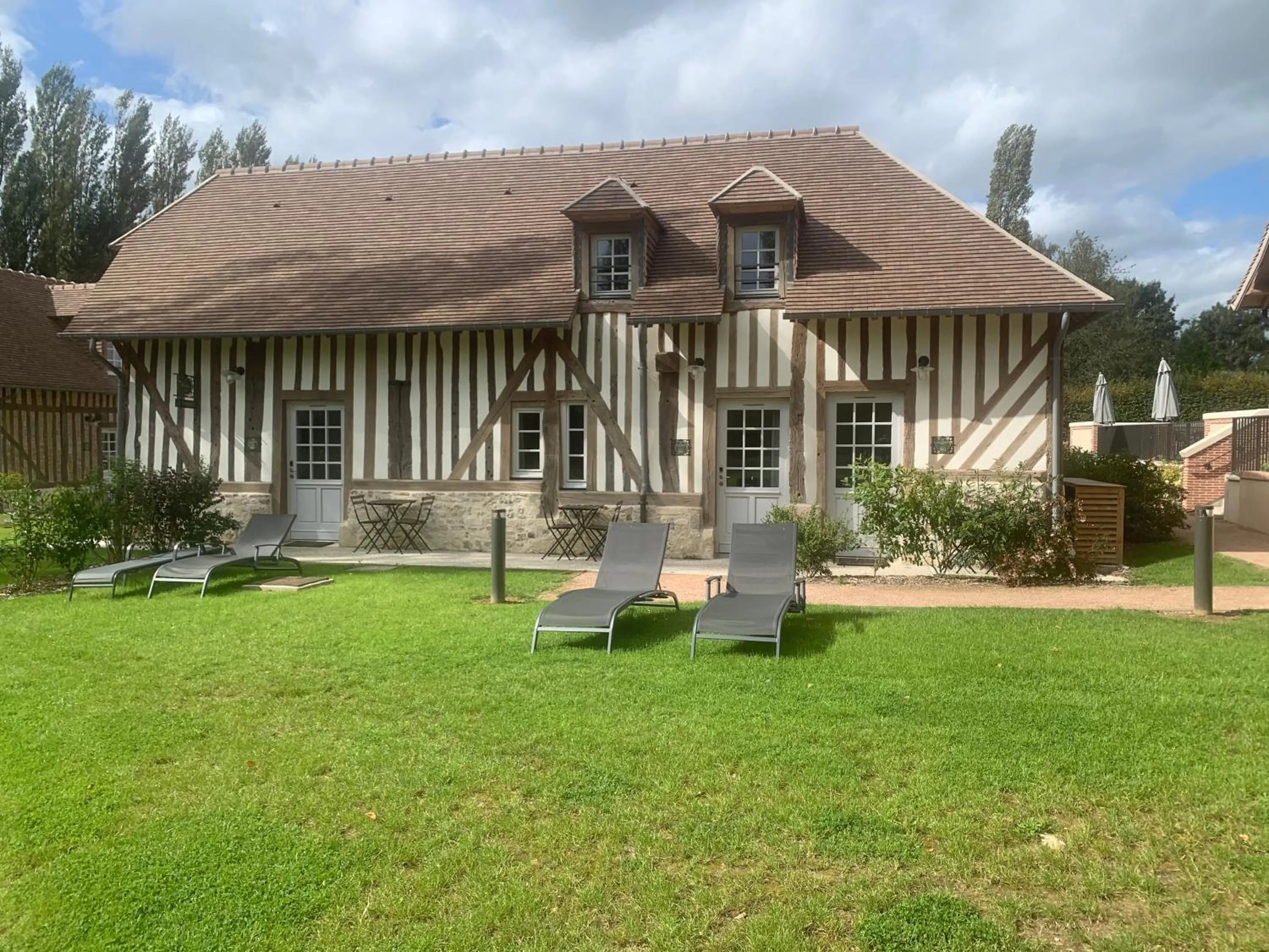 Garden view in Les Manoirs des Portes de Deauville - Small Luxury Hotel Of The World