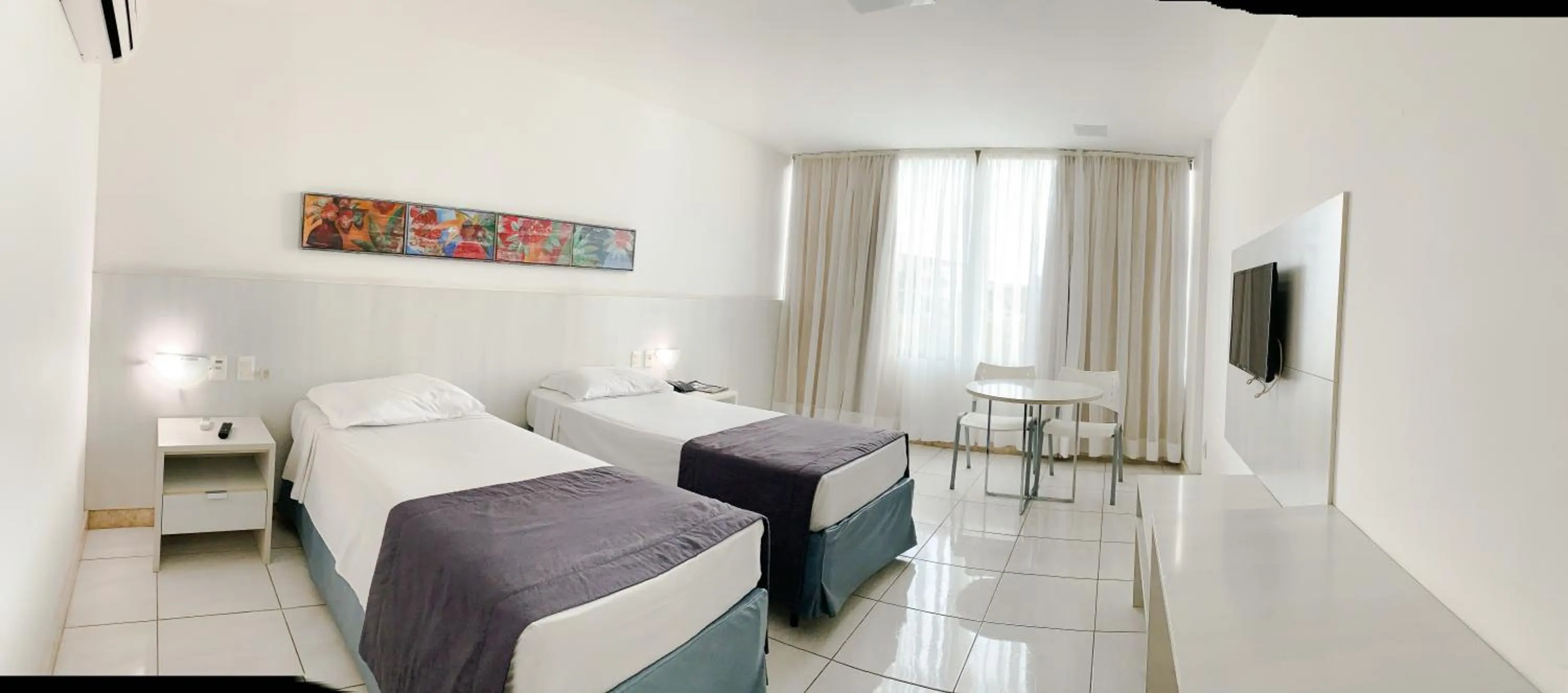 Bed in Cambuci Hotel