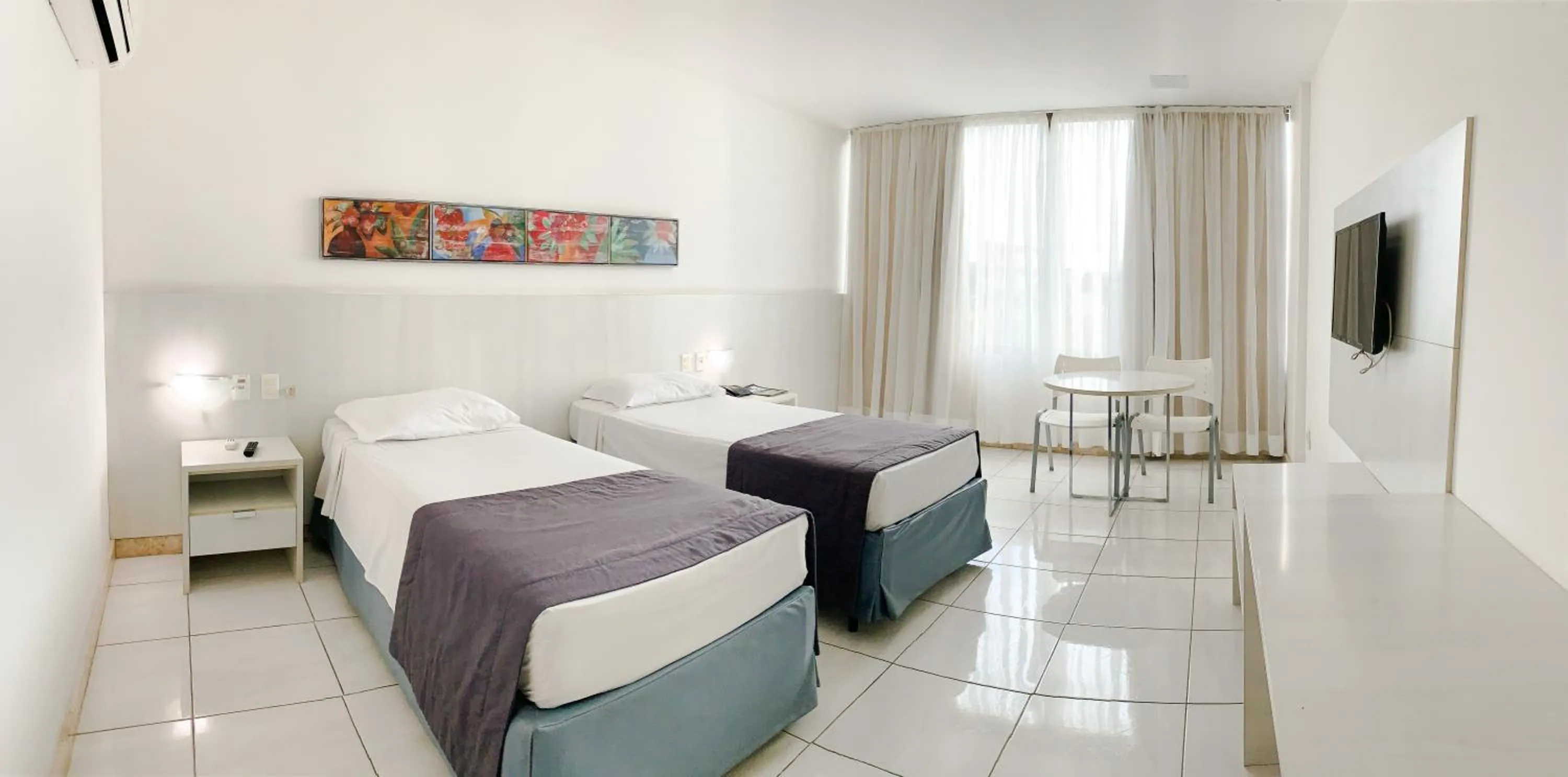 Bed in Cambuci Hotel