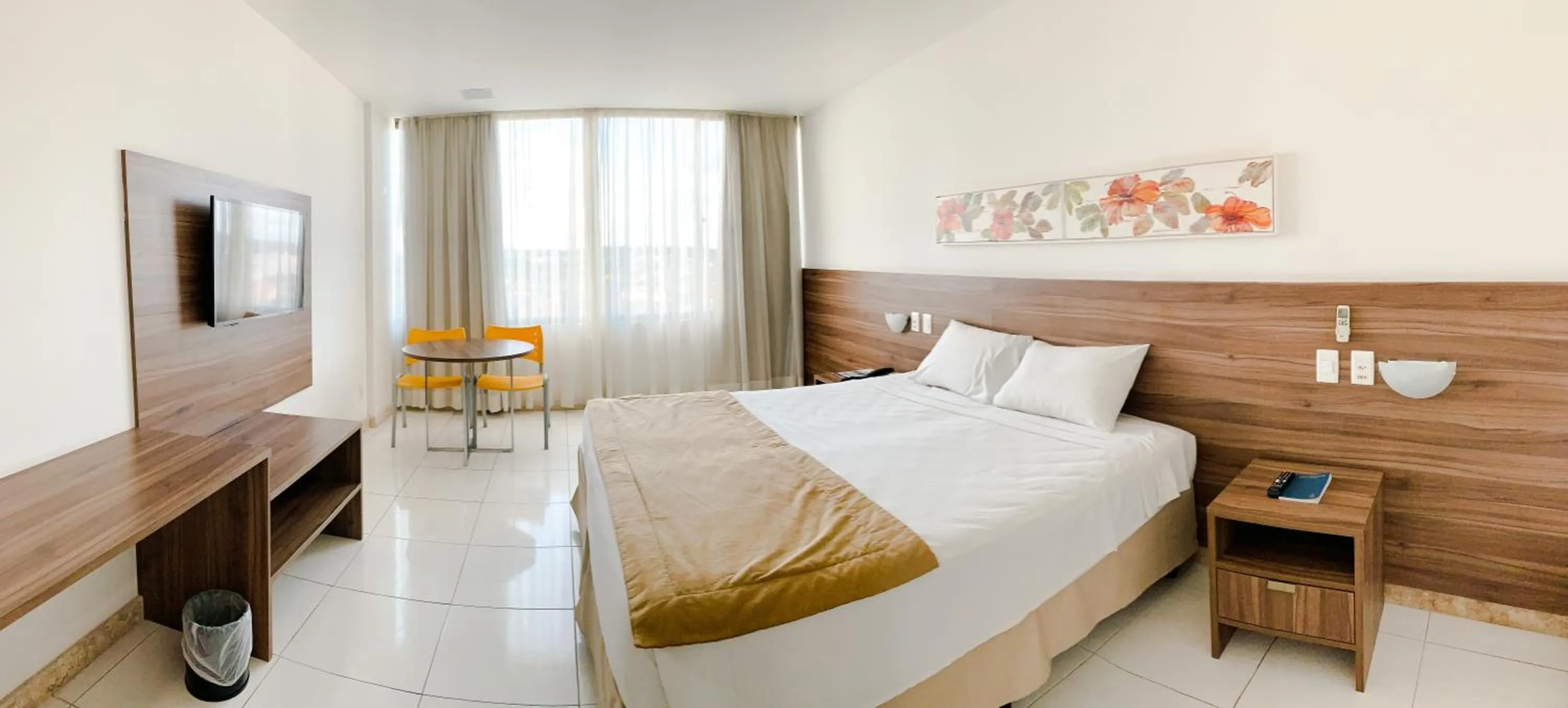 Bed in Cambuci Hotel