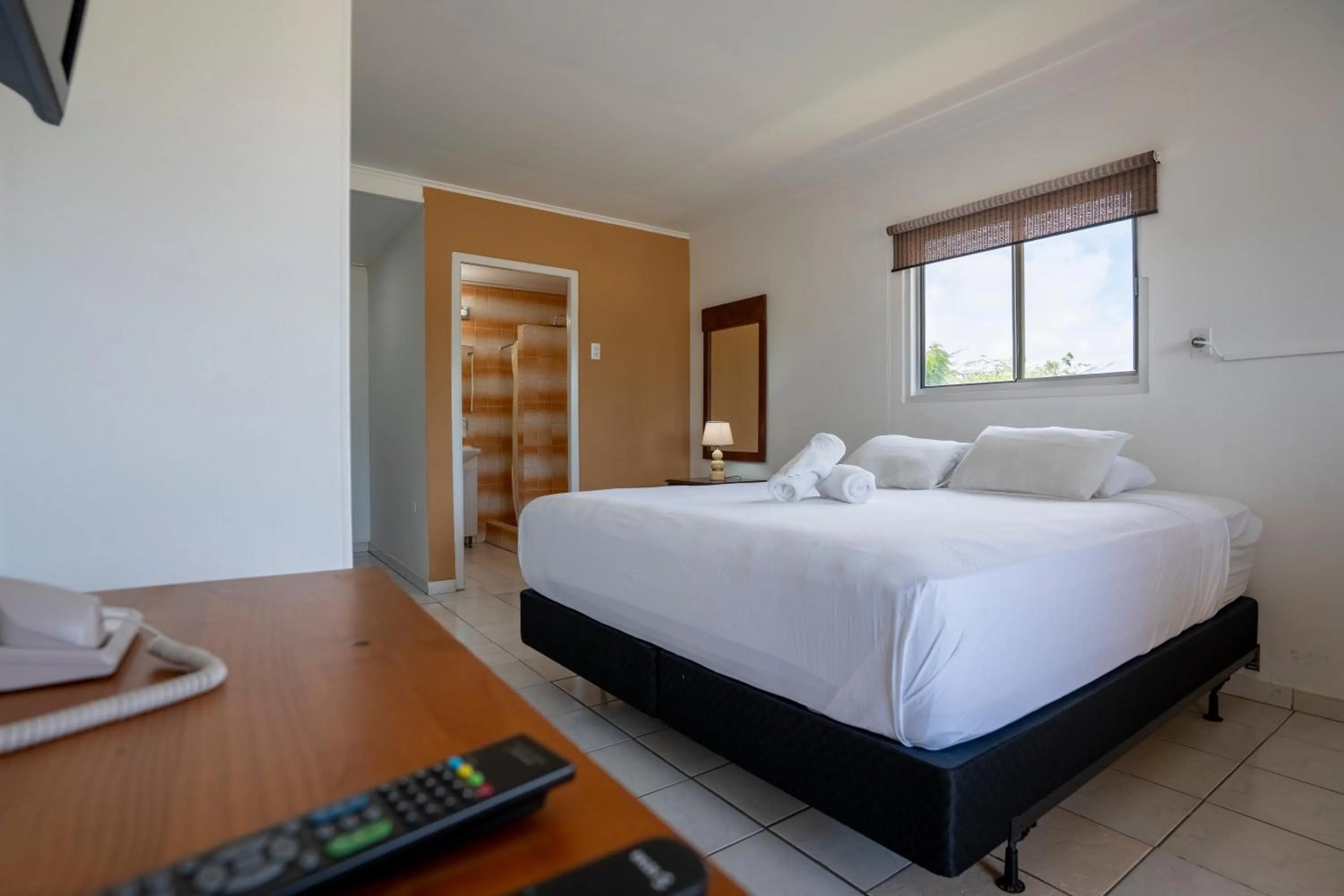 Photo of the whole room, Bed in Coconut Inn