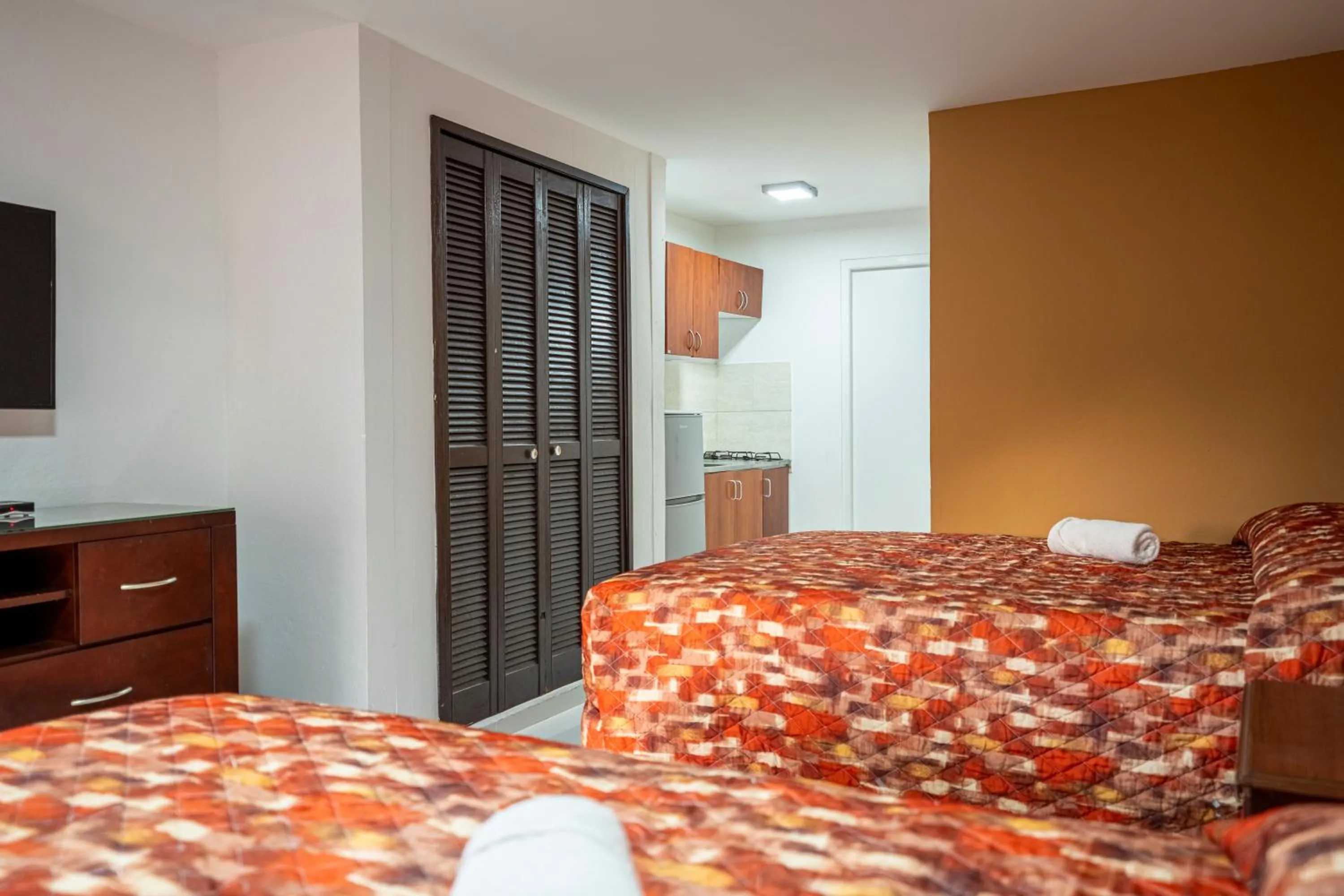 Photo of the whole room, Bed in Coconut Inn