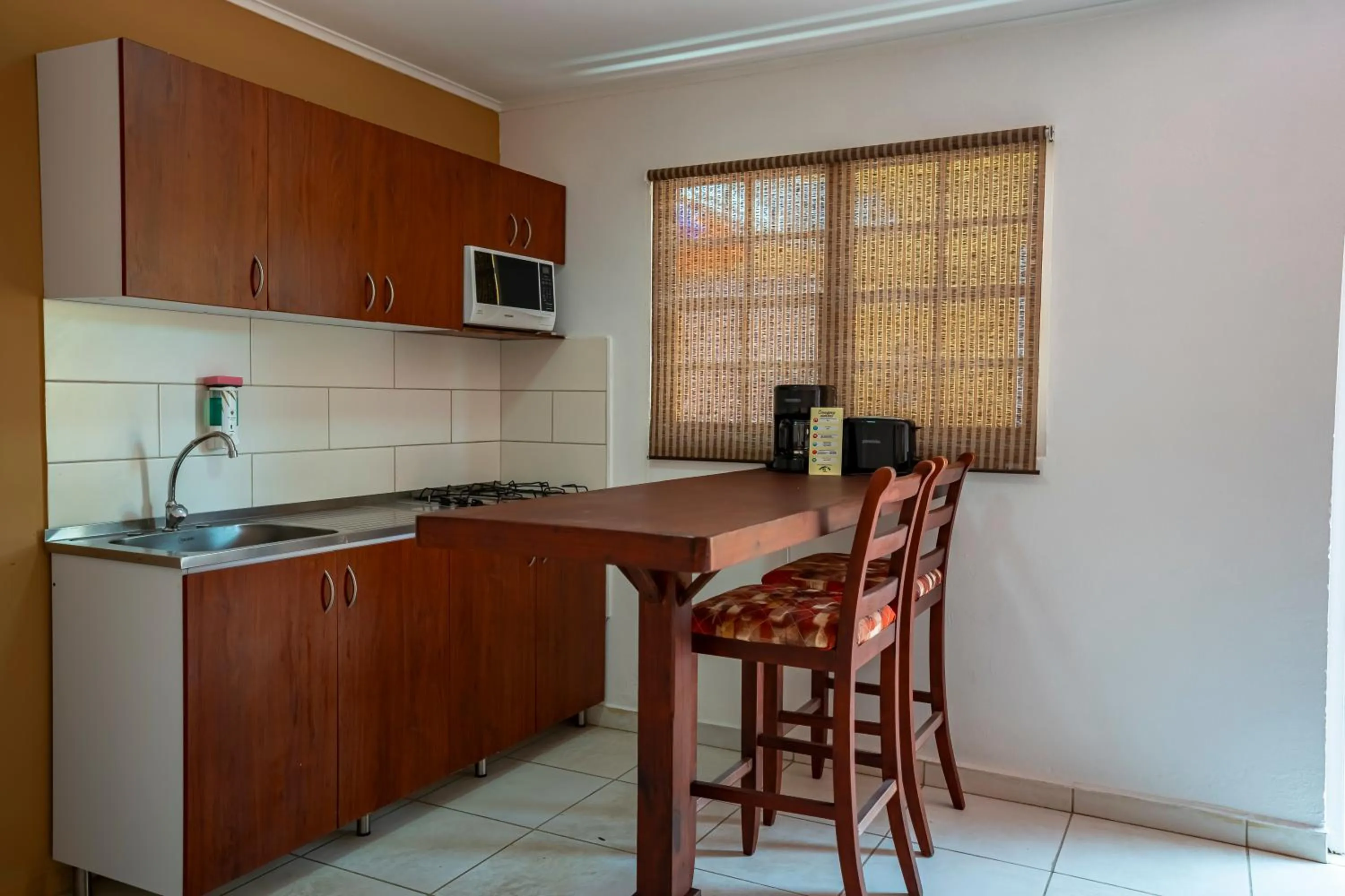 Kitchen or kitchenette in Coconut Inn