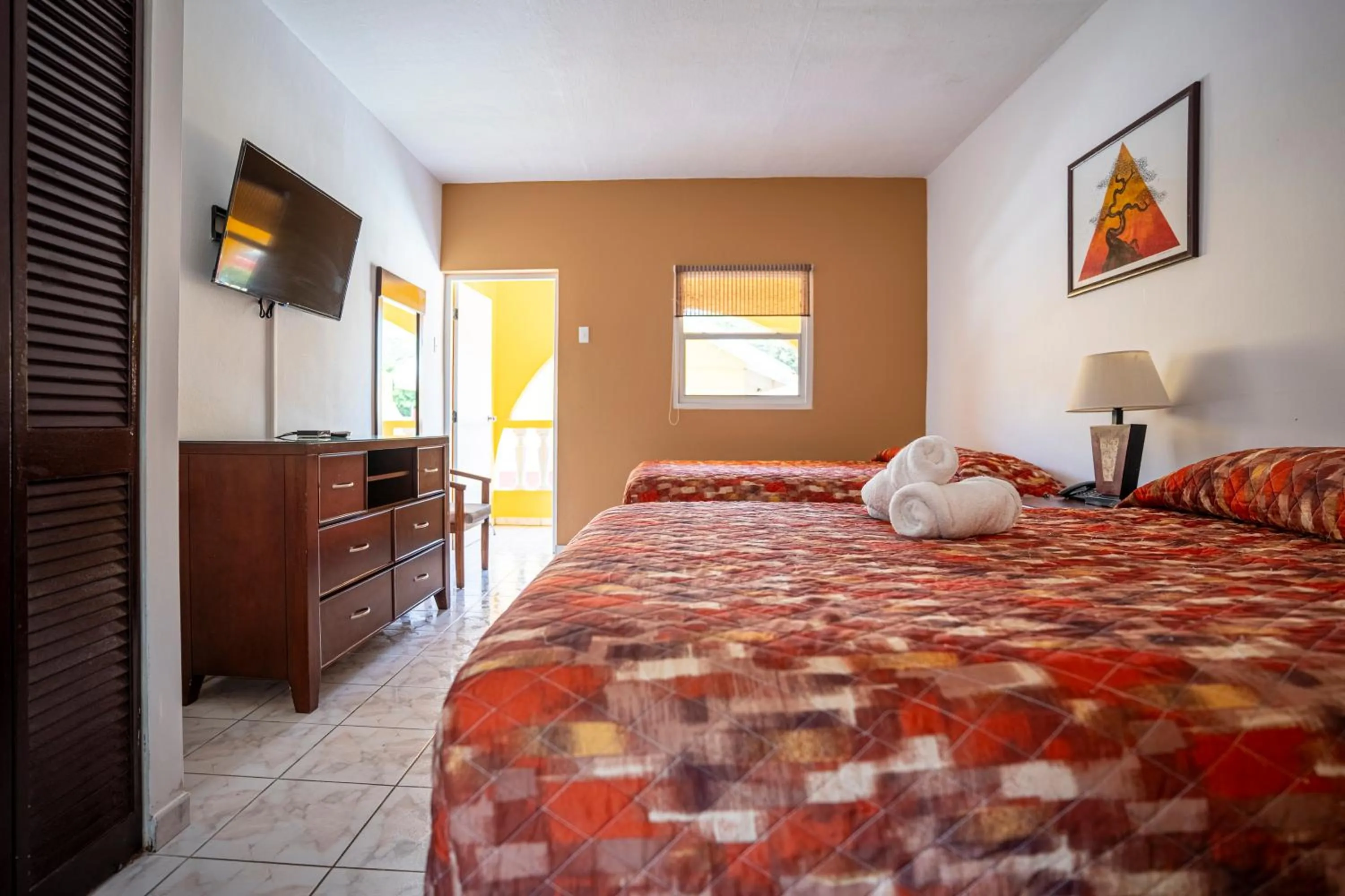 Photo of the whole room, Bed in Coconut Inn