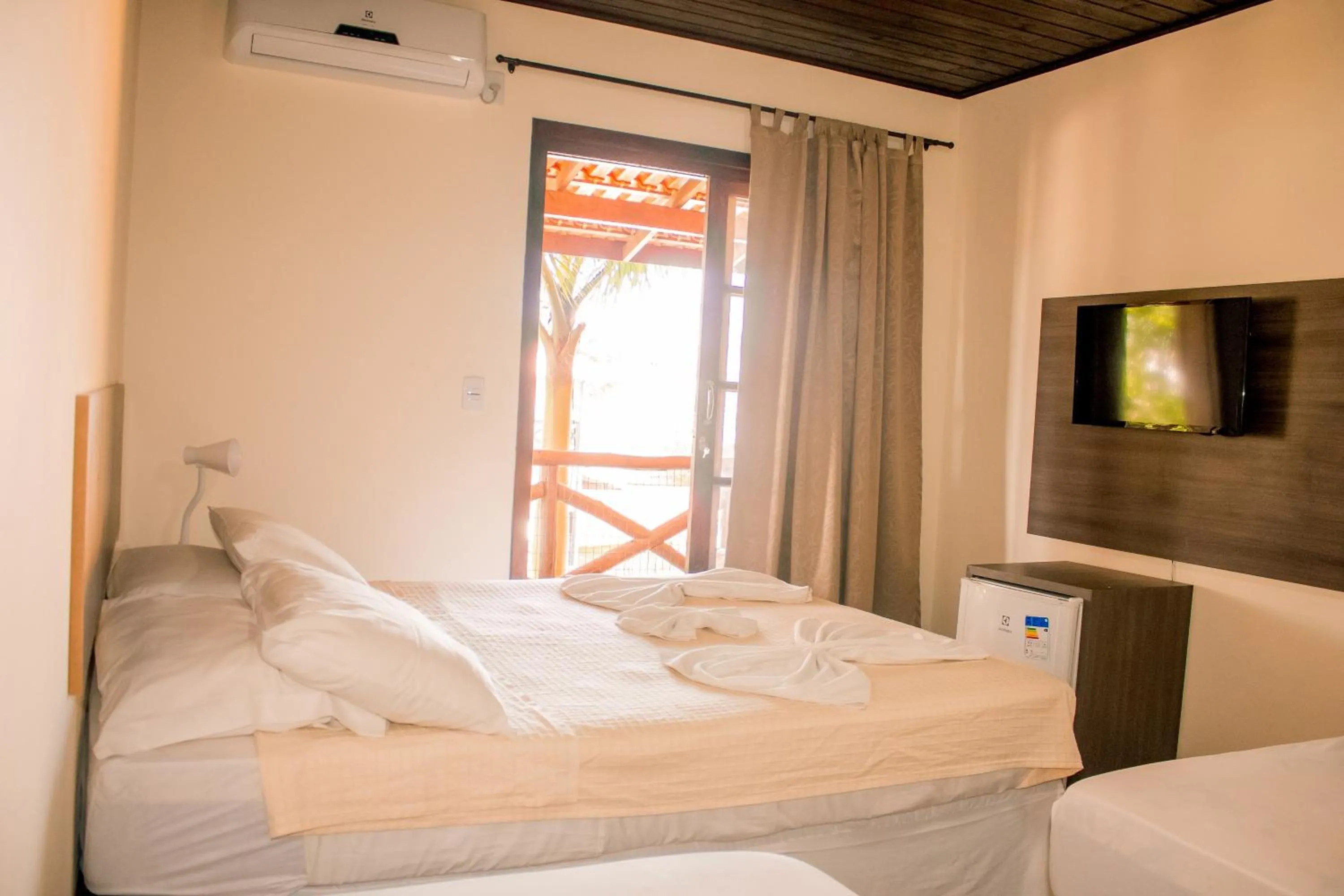 Bed in Pousada Canto Grande