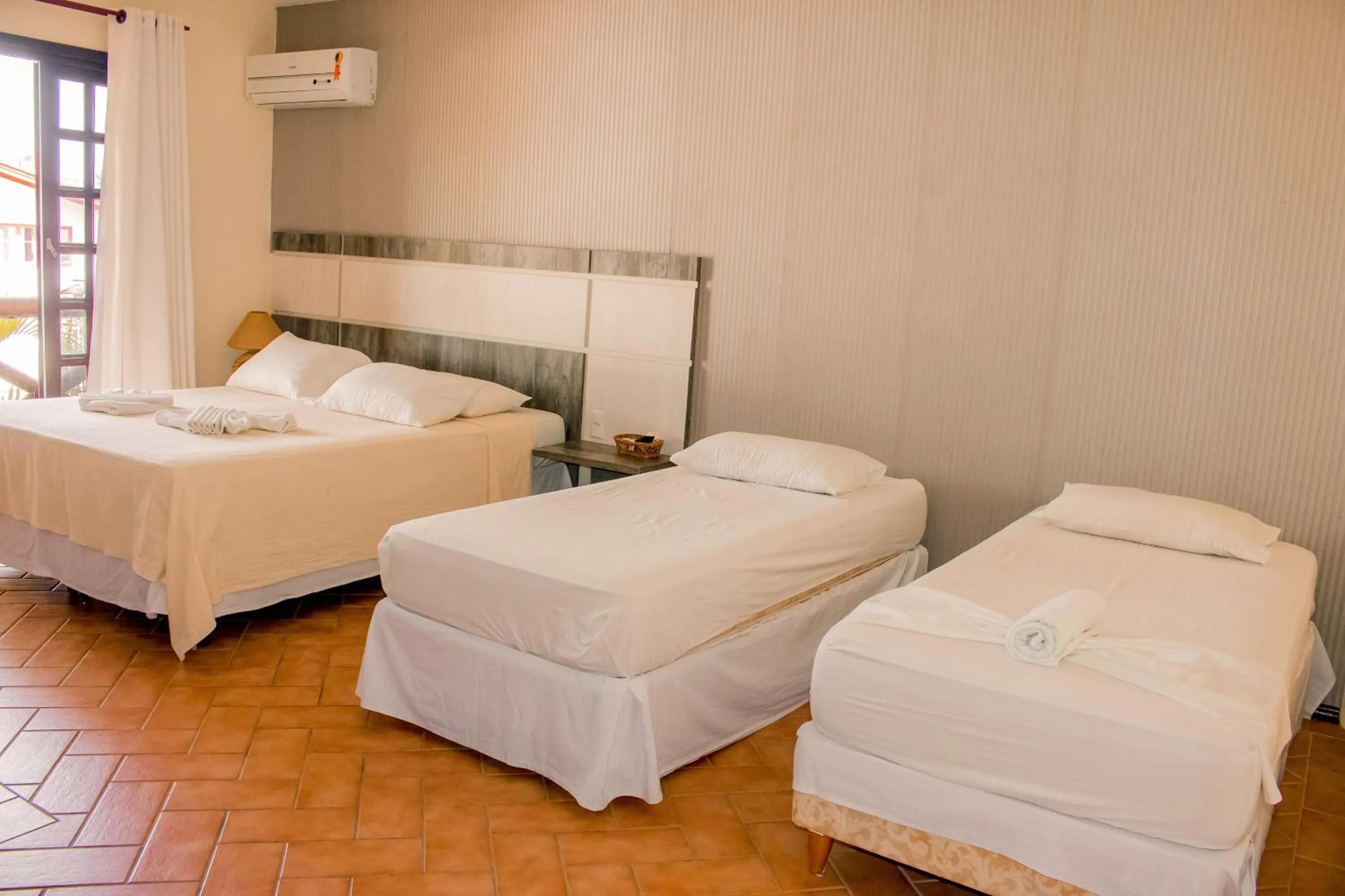 Bed in Pousada Canto Grande