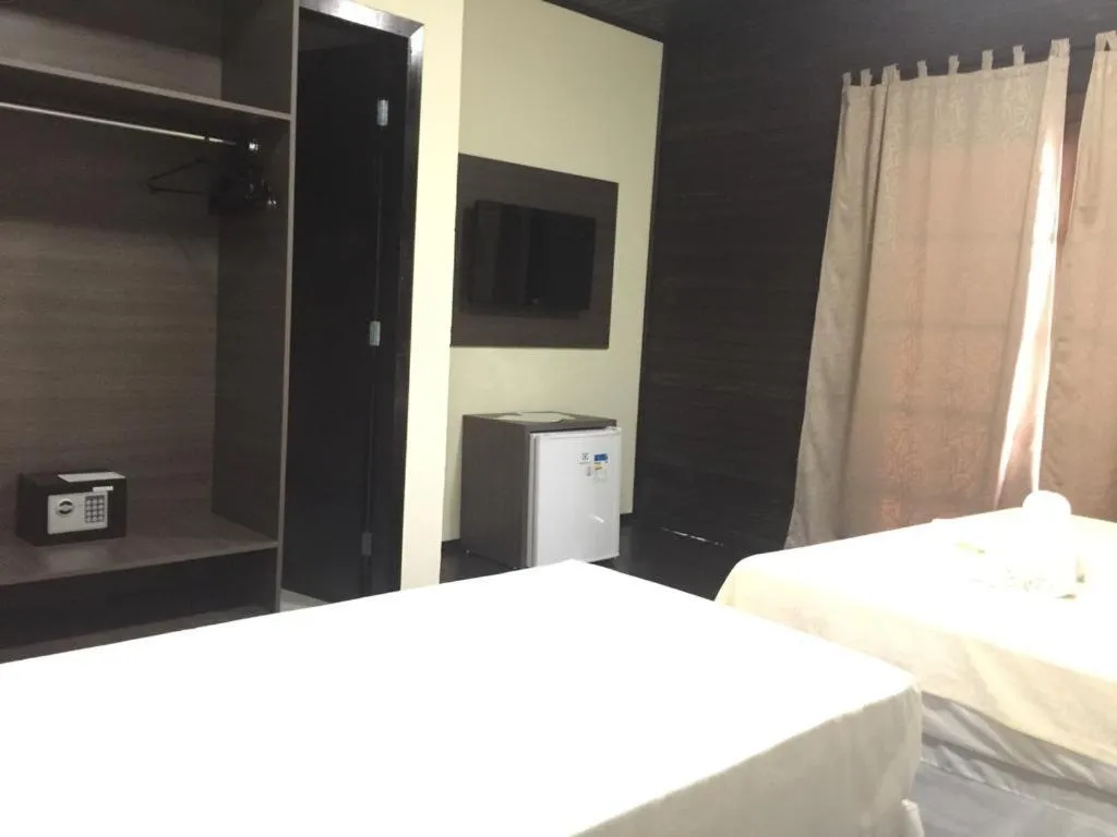 Bed in Pousada Canto Grande