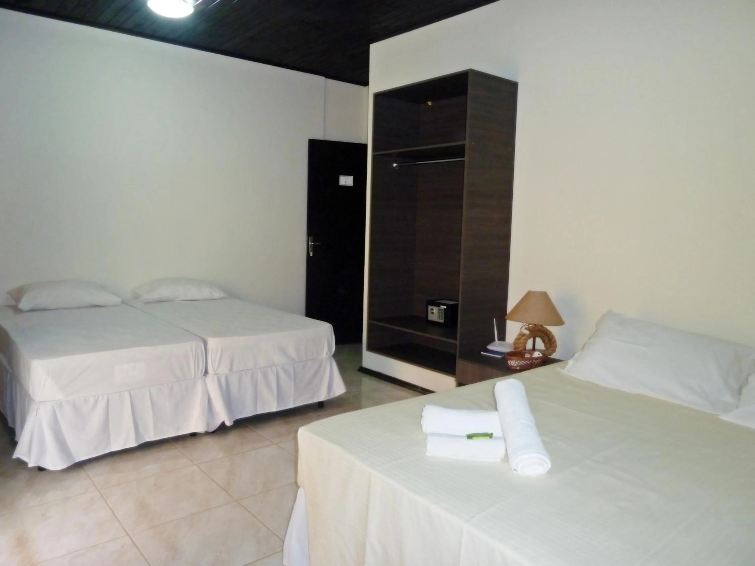 Bed in Pousada Canto Grande