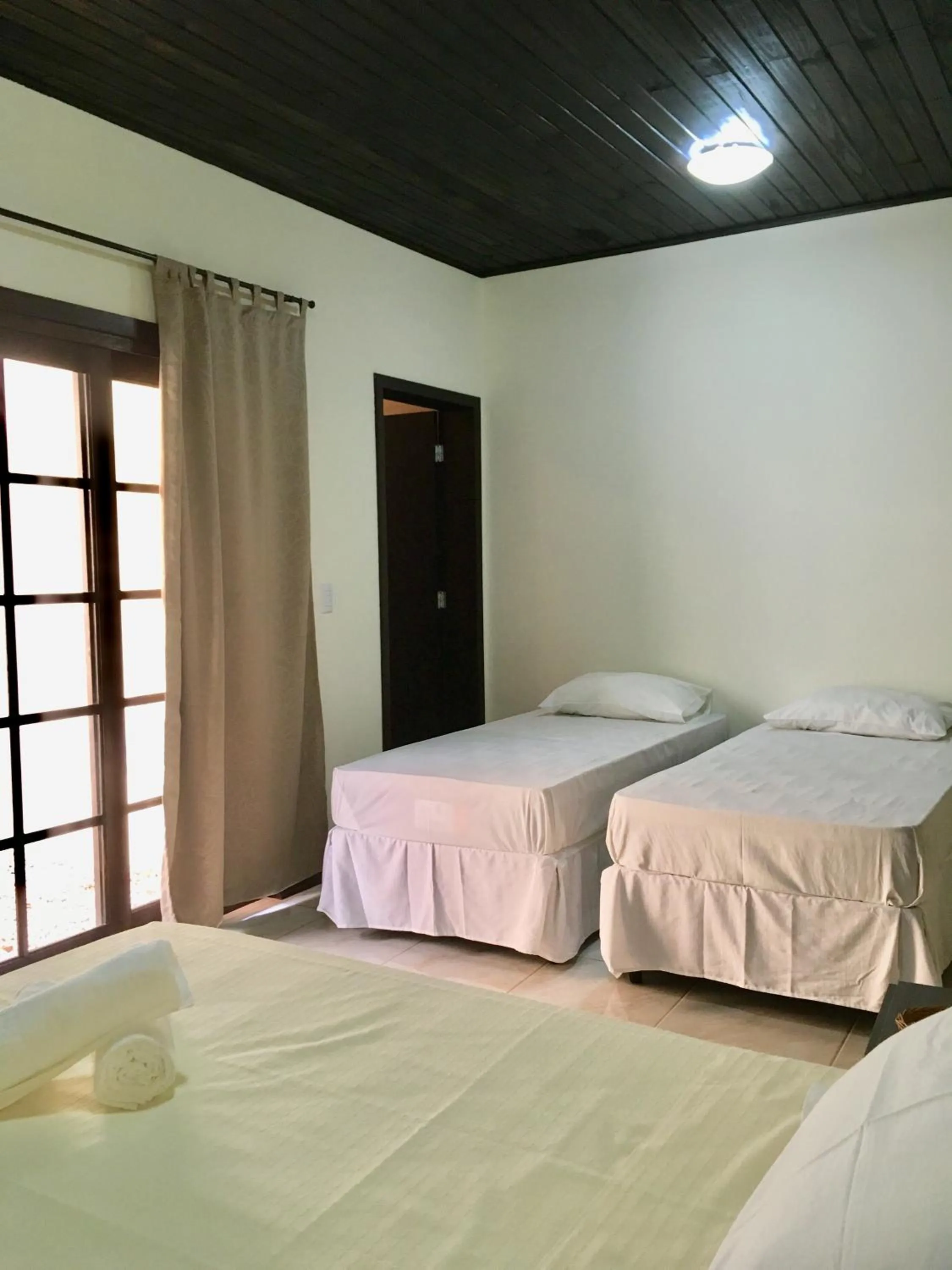 Bed in Pousada Canto Grande