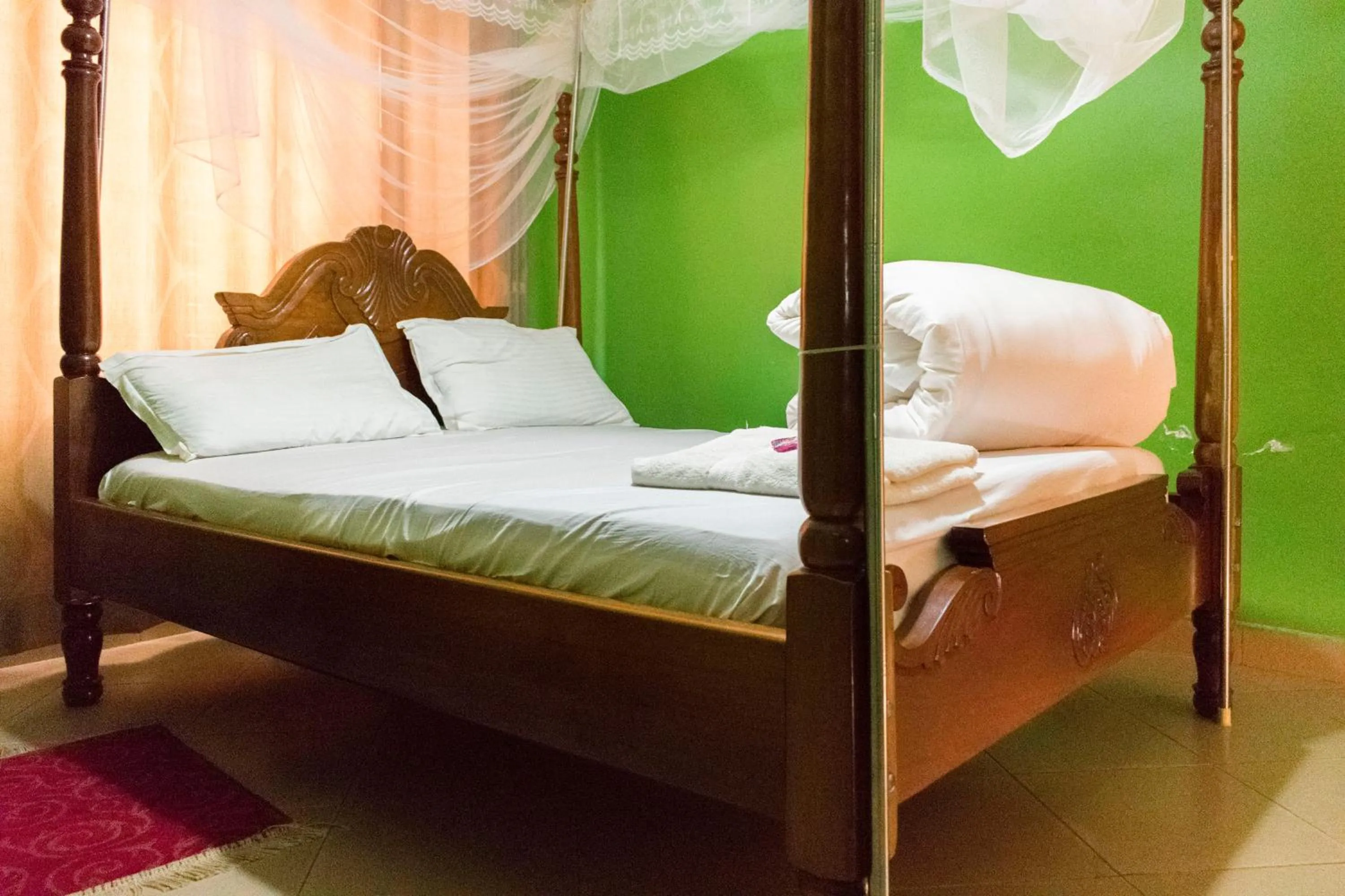 Bed in Rates Motel Mbale