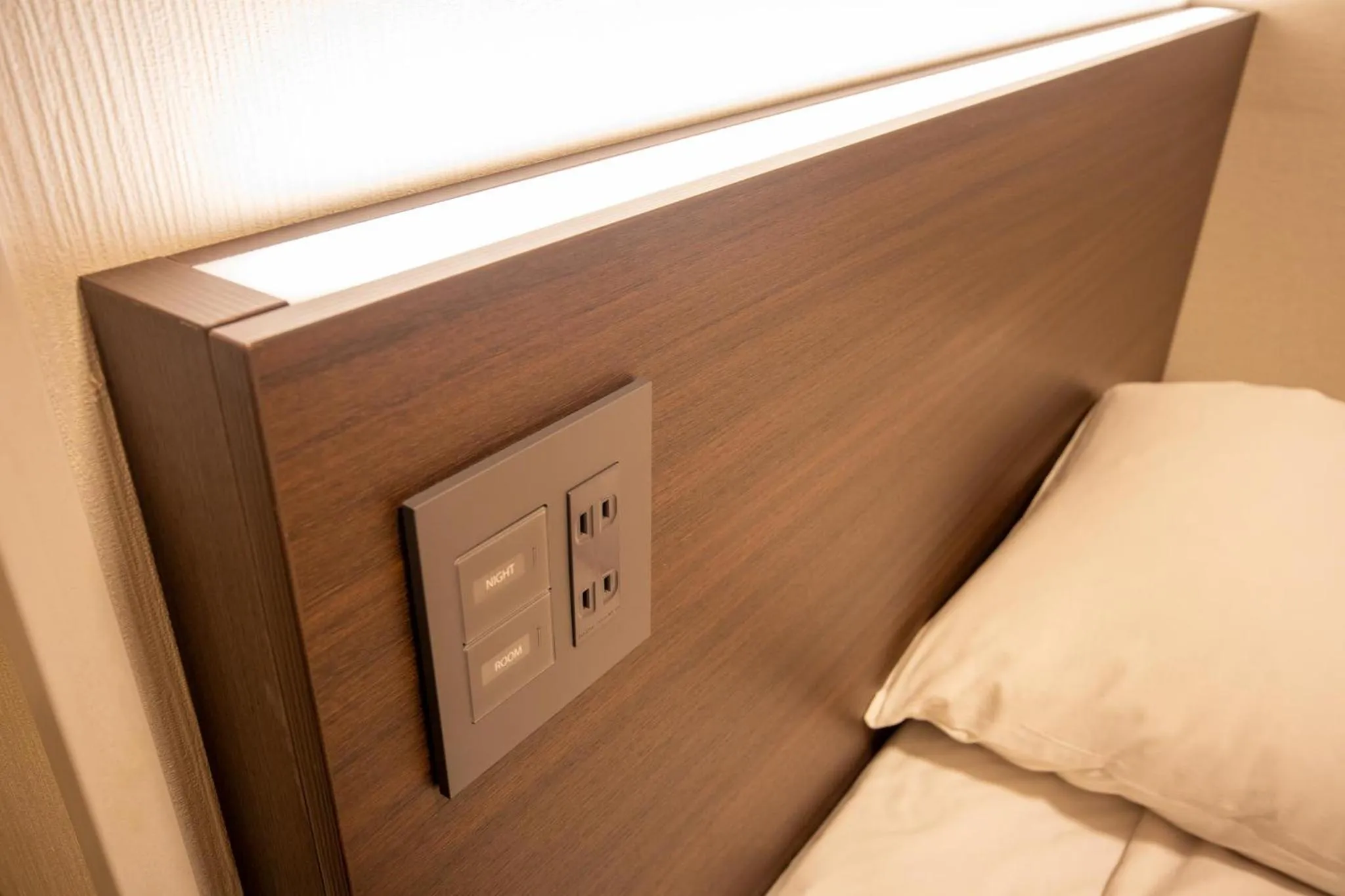 Bed in Hotel Aisul Matsuyama