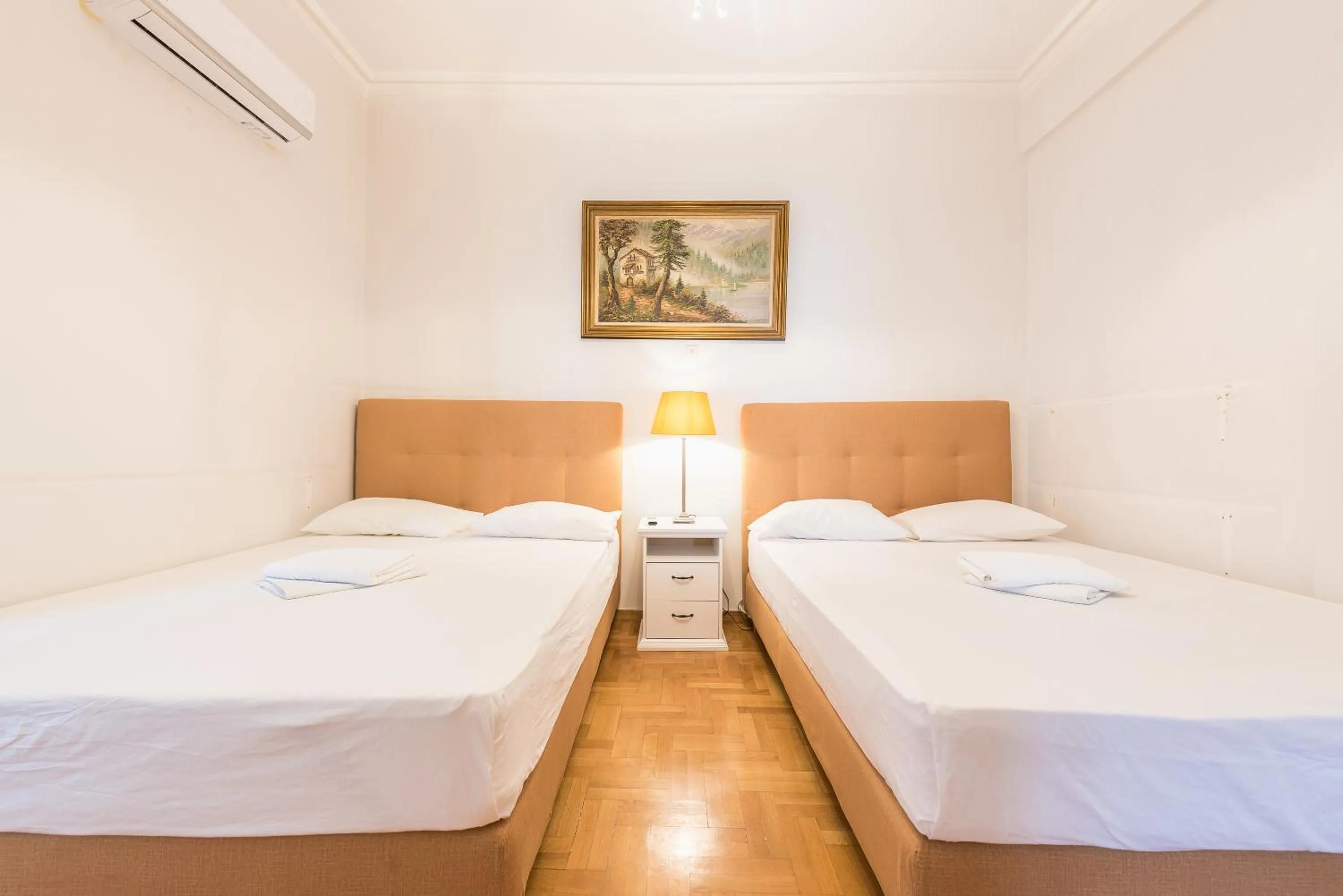 Bed in Athens Empire Paradise Apartment