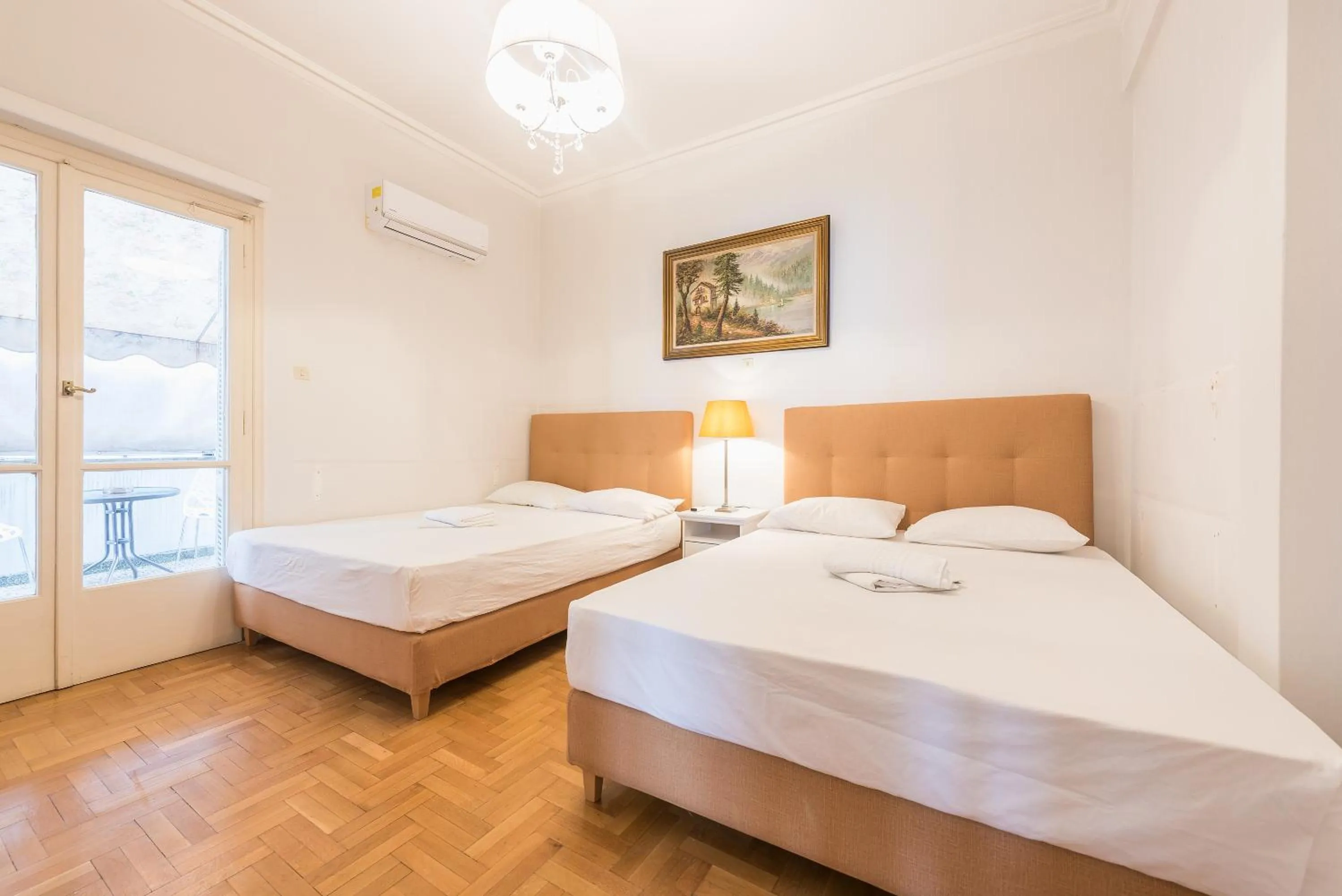 Bed in Athens Empire Paradise Apartment