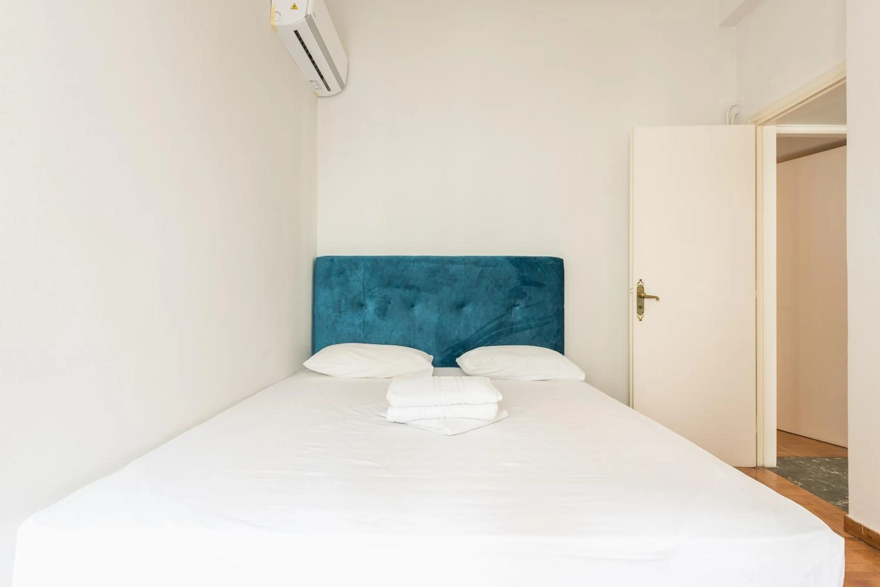 Bed in Athens Empire Paradise Apartment