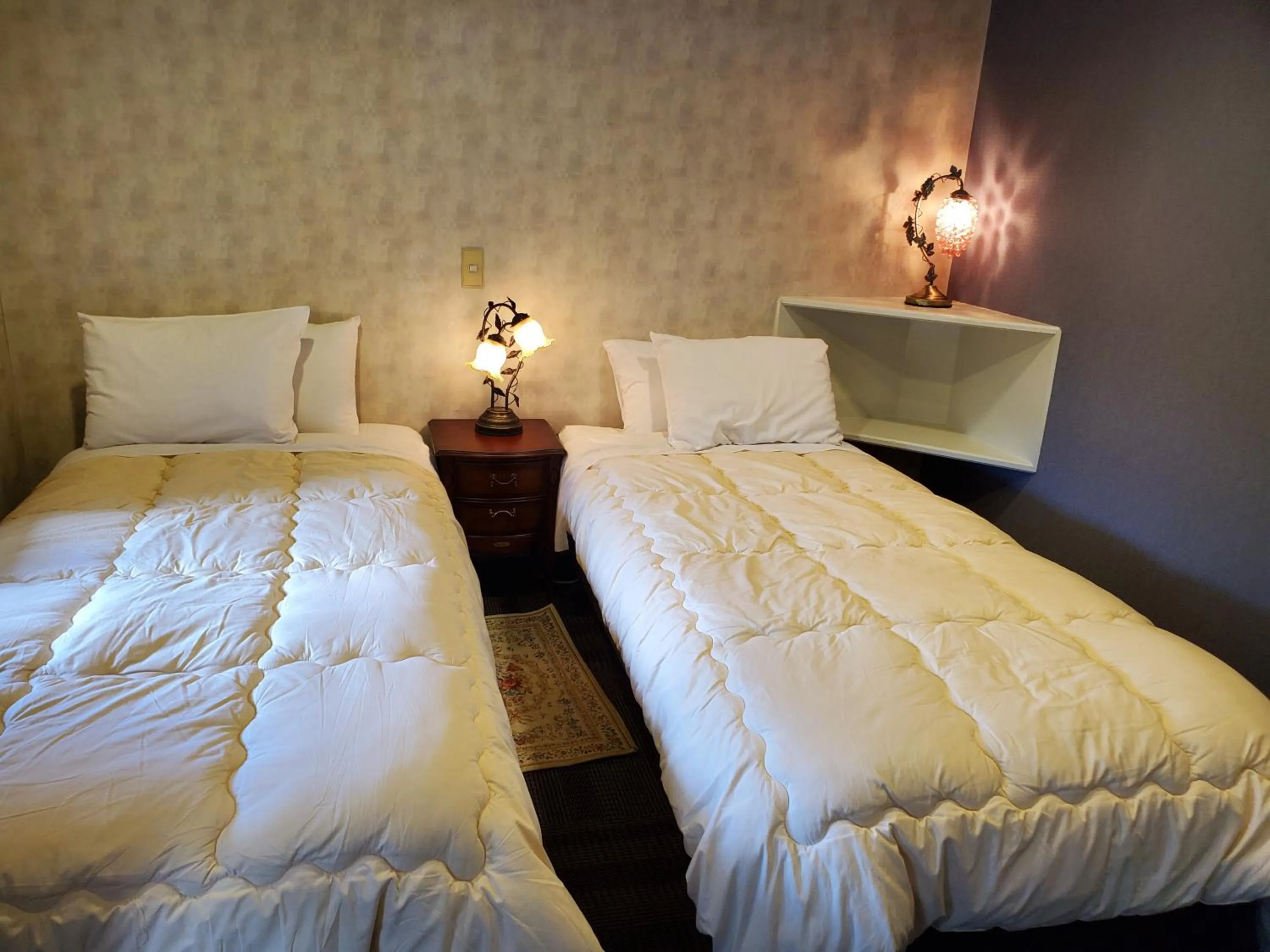 Bed in プチホテル葡萄屋