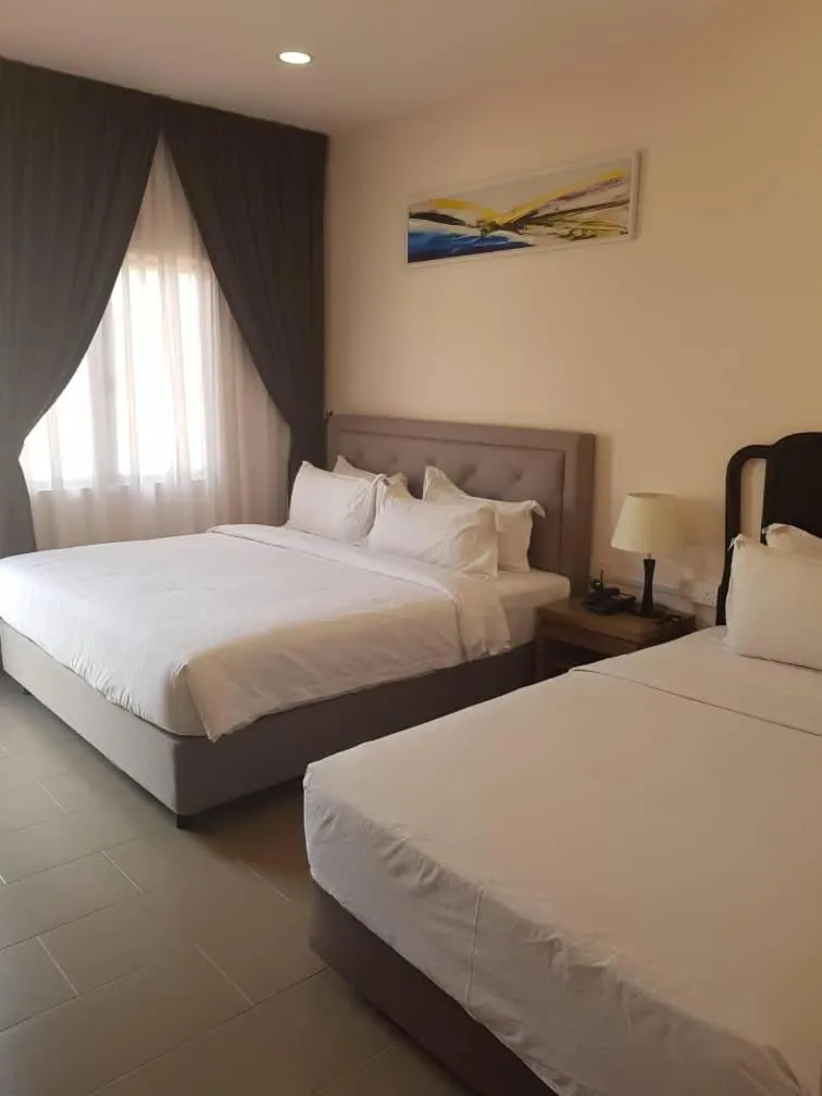 Bed in Lotus Seaview Beach Resort, Pengerang