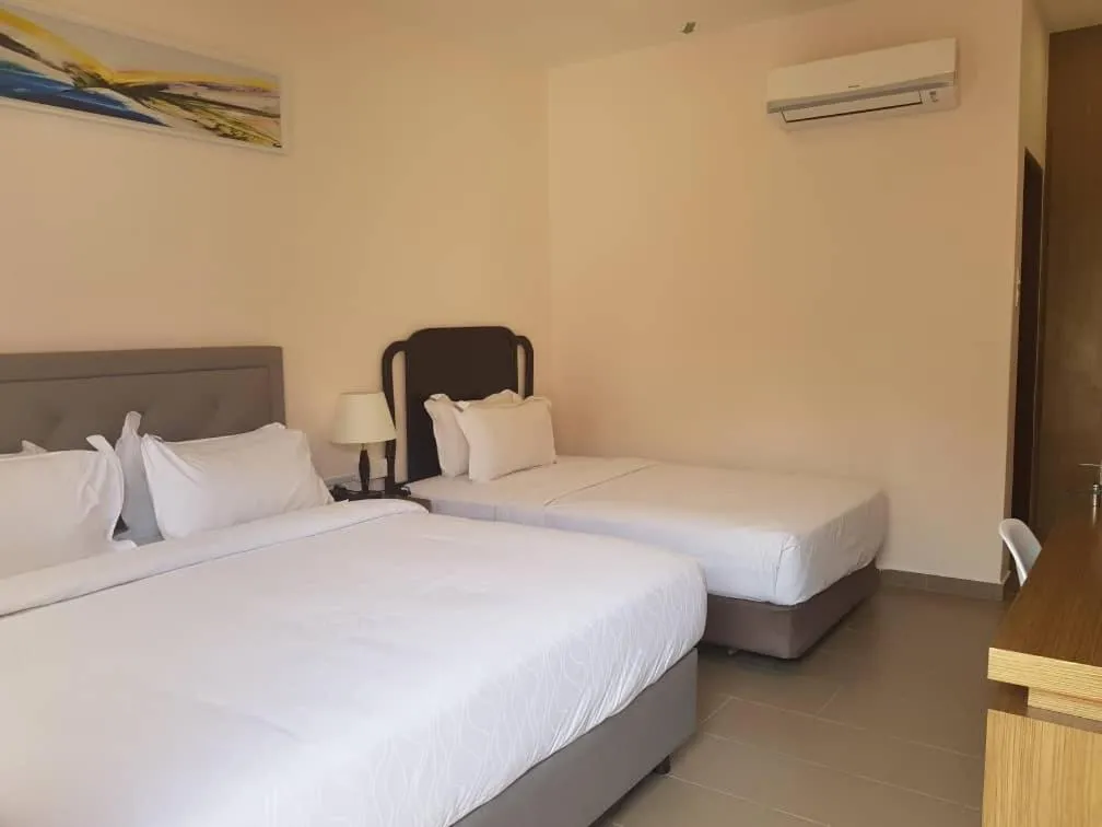 Bed in Lotus Seaview Beach Resort, Pengerang