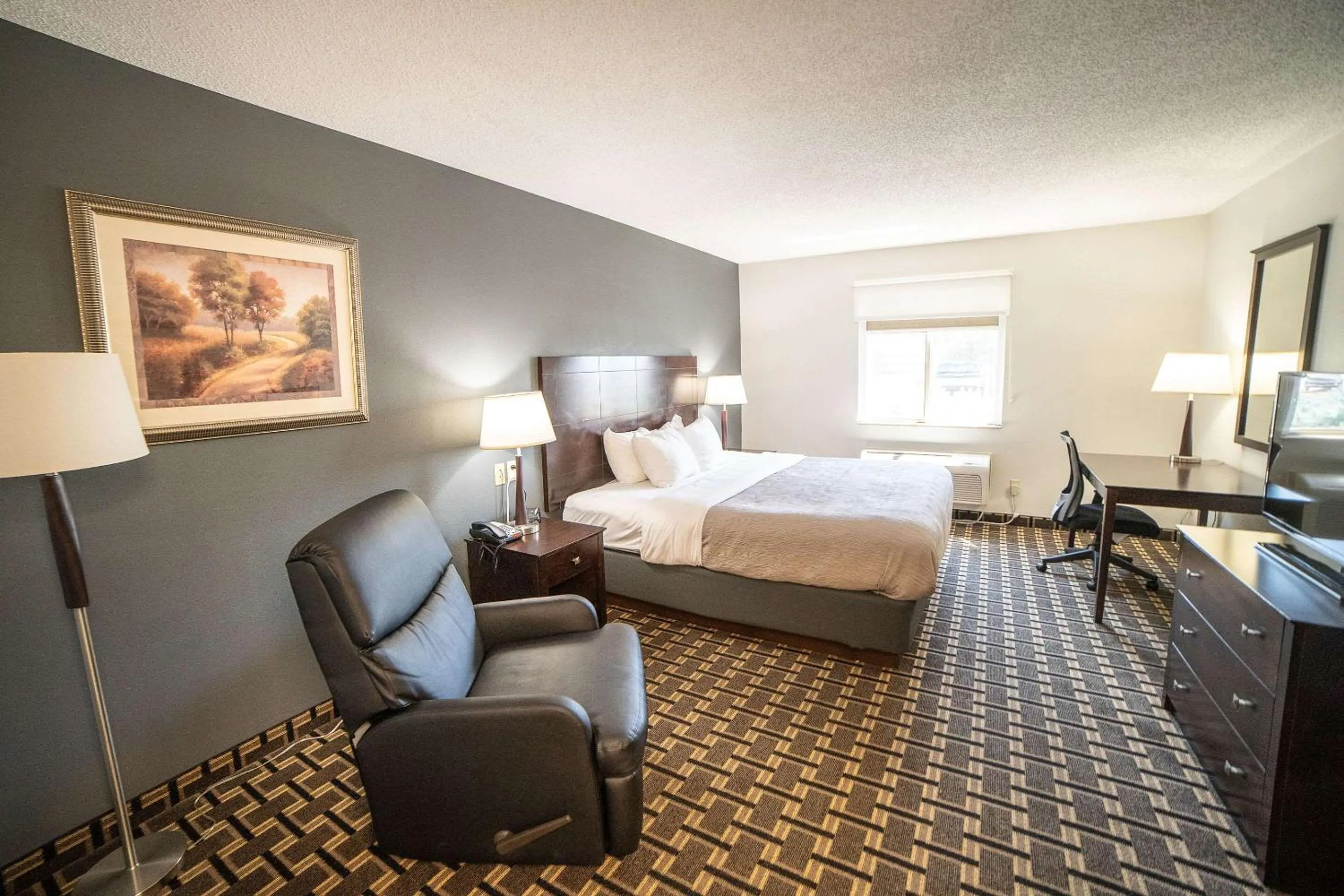 Bedroom, Bed in Quality Inn & Suites Watertown near Prairie Lakes Ice Arena