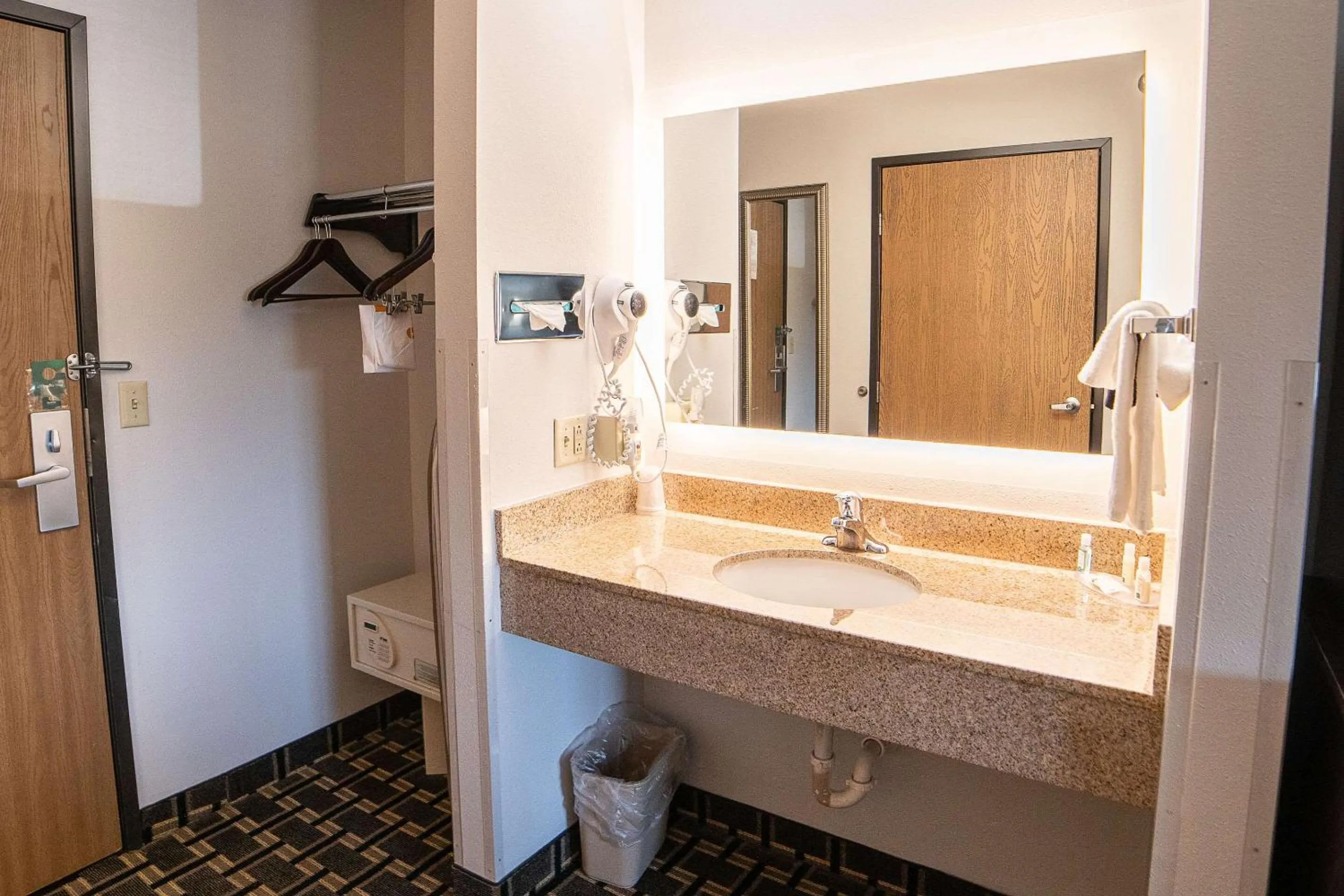 Bedroom in Quality Inn & Suites Watertown near Prairie Lakes Ice Arena