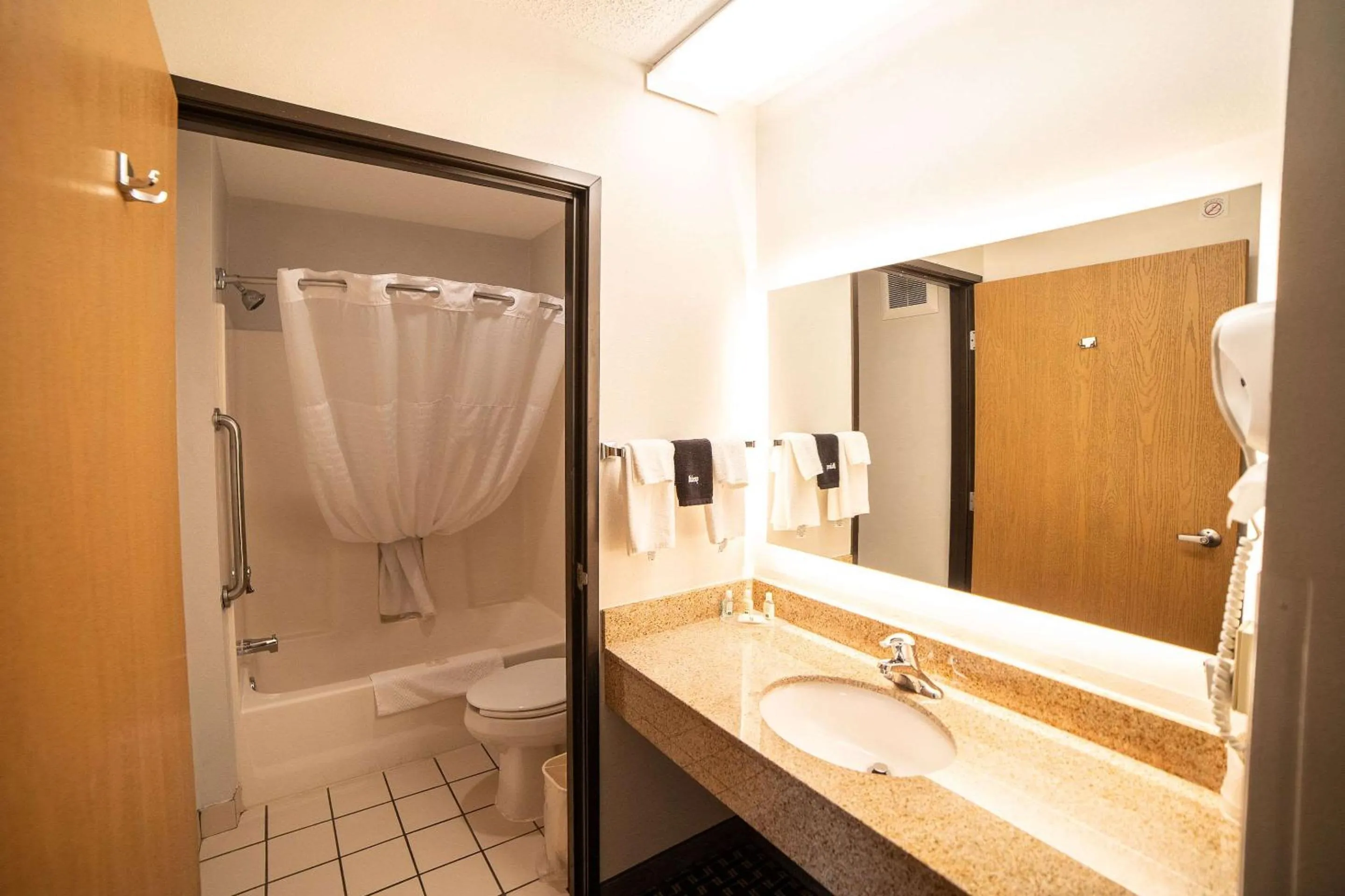 Bedroom in Quality Inn & Suites Watertown near Prairie Lakes Ice Arena