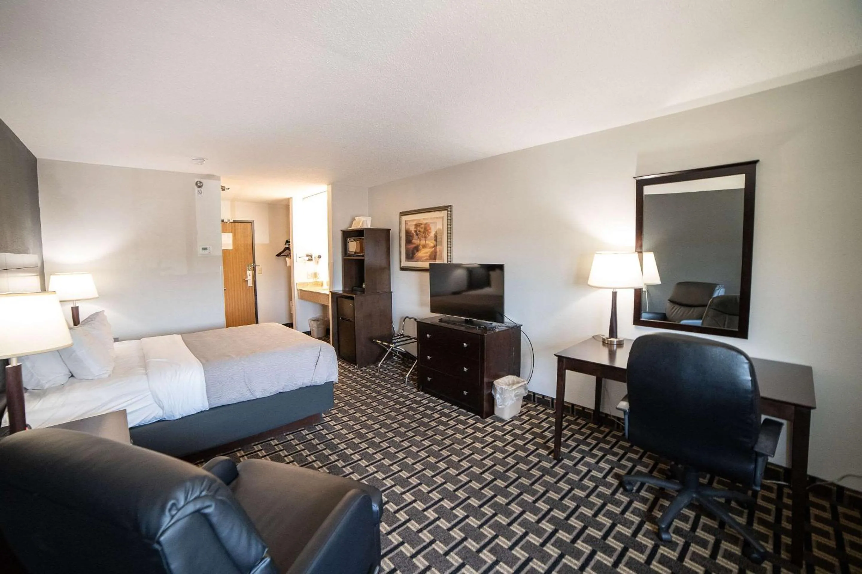 Bedroom in Quality Inn & Suites Watertown near Prairie Lakes Ice Arena