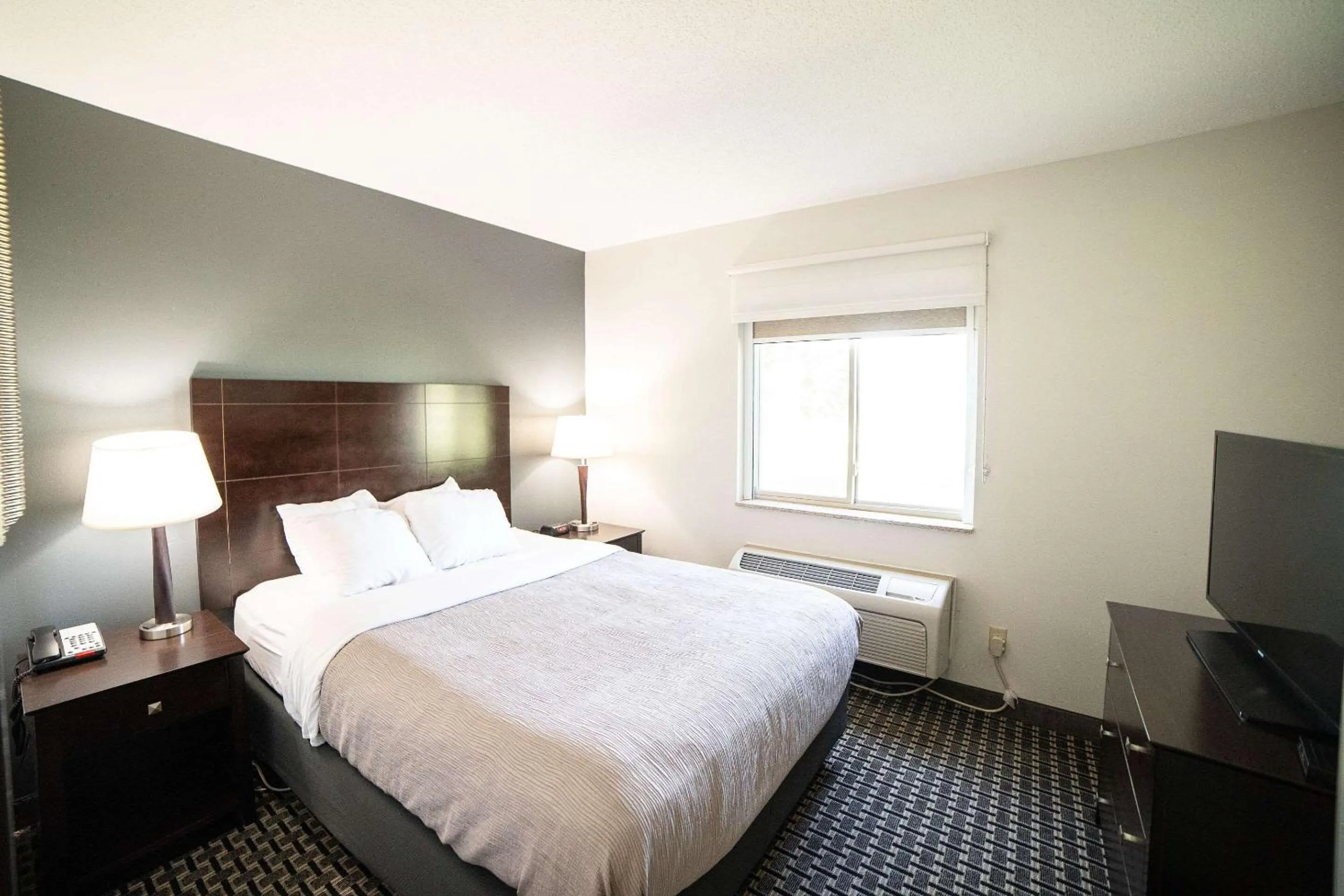 Bedroom, Bed in Quality Inn & Suites Watertown near Prairie Lakes Ice Arena