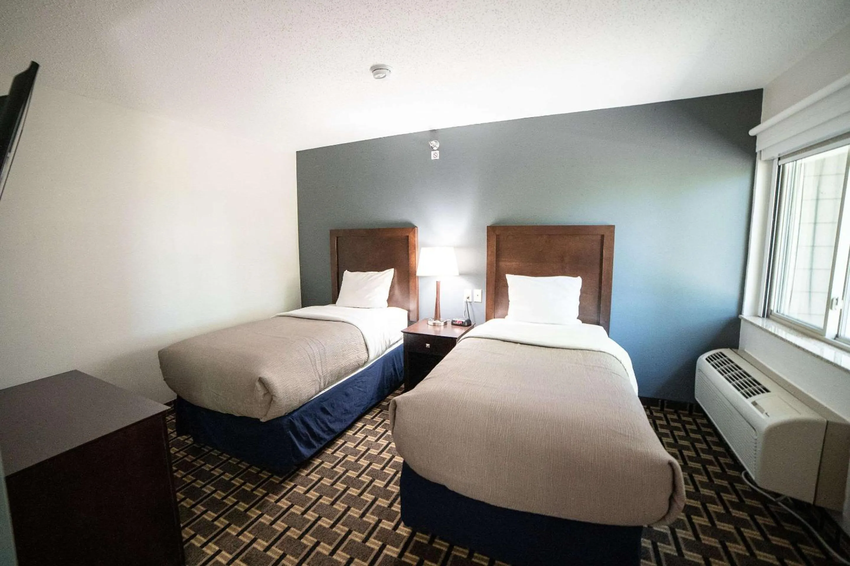 Bedroom, Bed in Quality Inn & Suites Watertown near Prairie Lakes Ice Arena