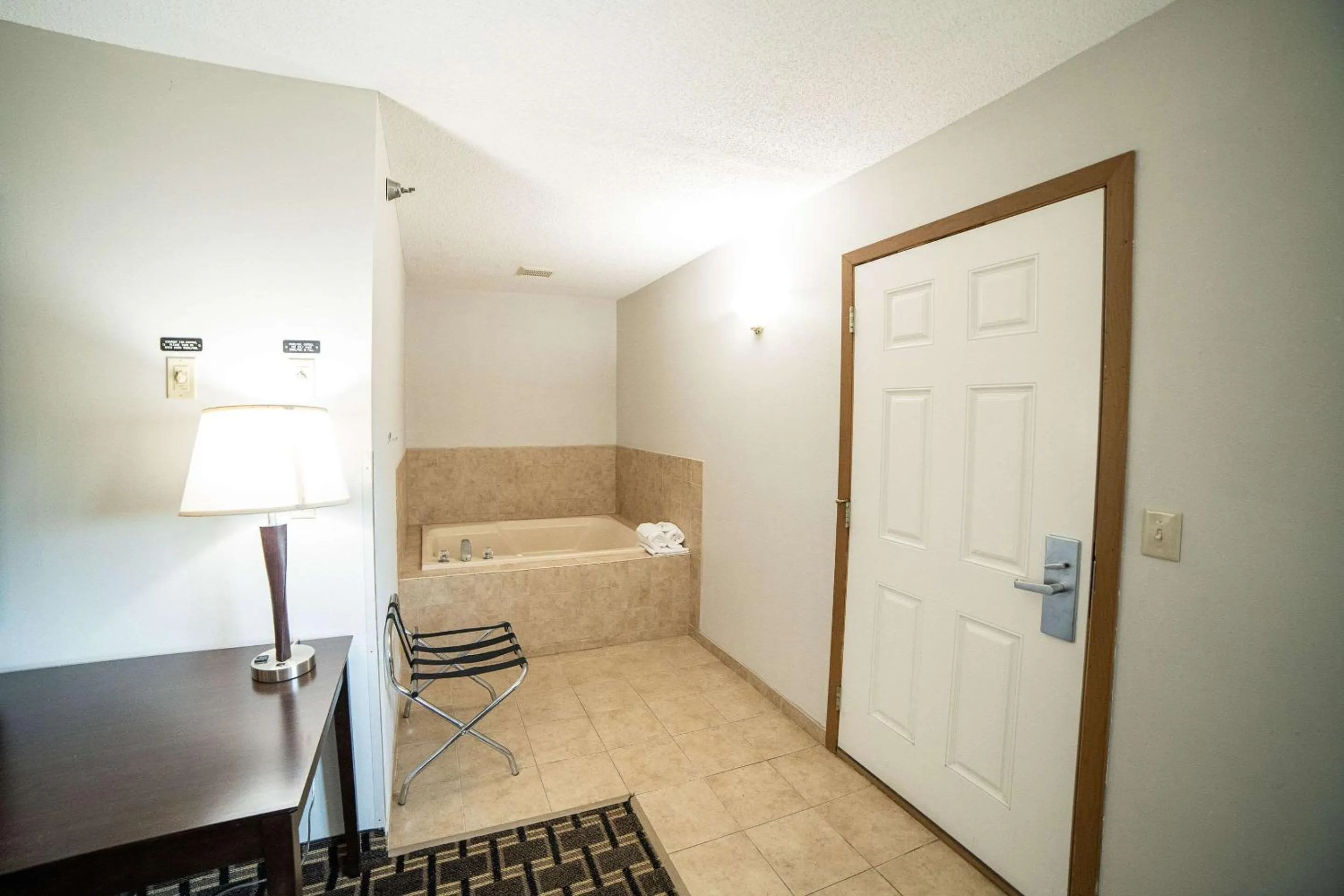 Bedroom in Quality Inn & Suites Watertown near Prairie Lakes Ice Arena