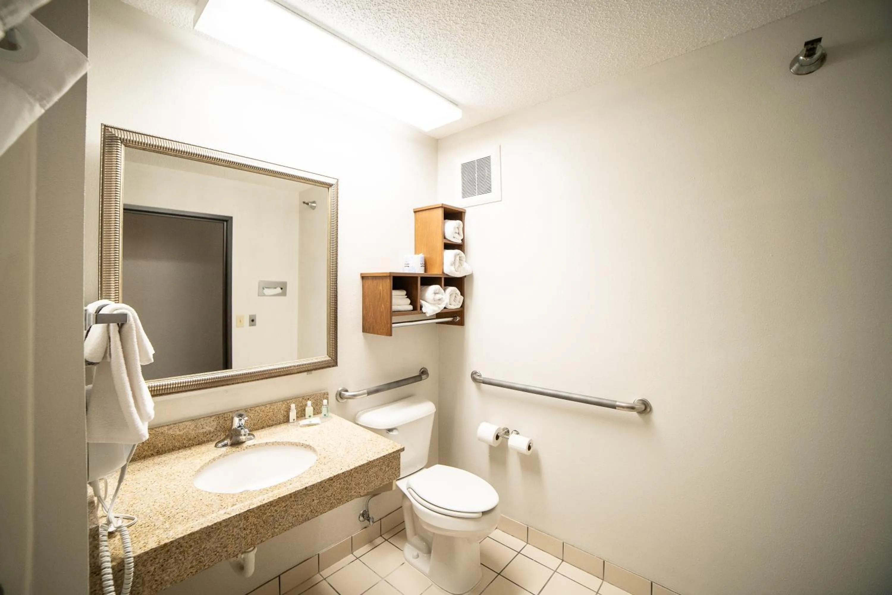 Bathroom in Quality Inn & Suites Watertown near Prairie Lakes Ice Arena