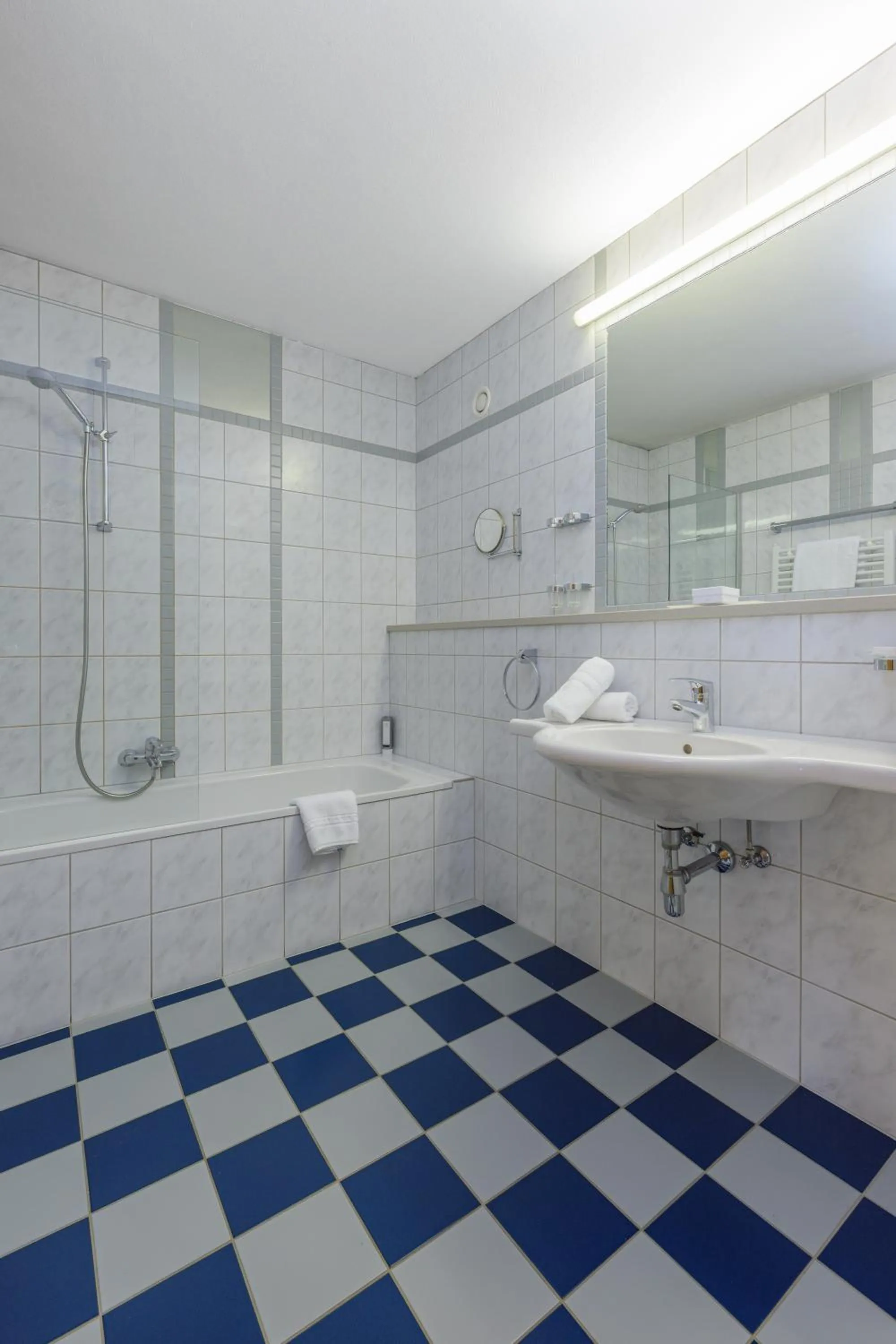 Bathroom in Landgasthof Bogner by SMK Event und Gastro