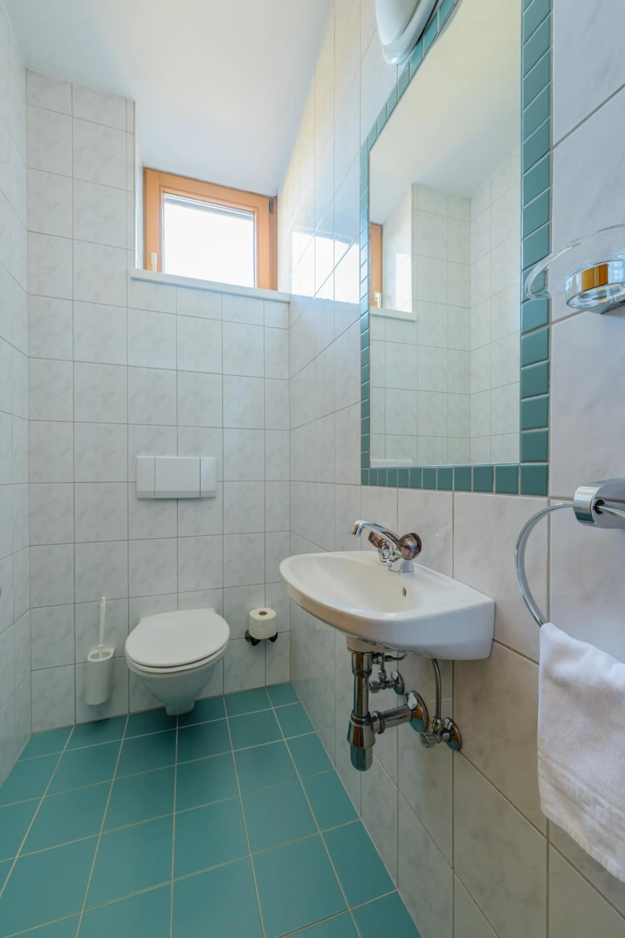 Bathroom in Landgasthof Bogner by SMK Event und Gastro