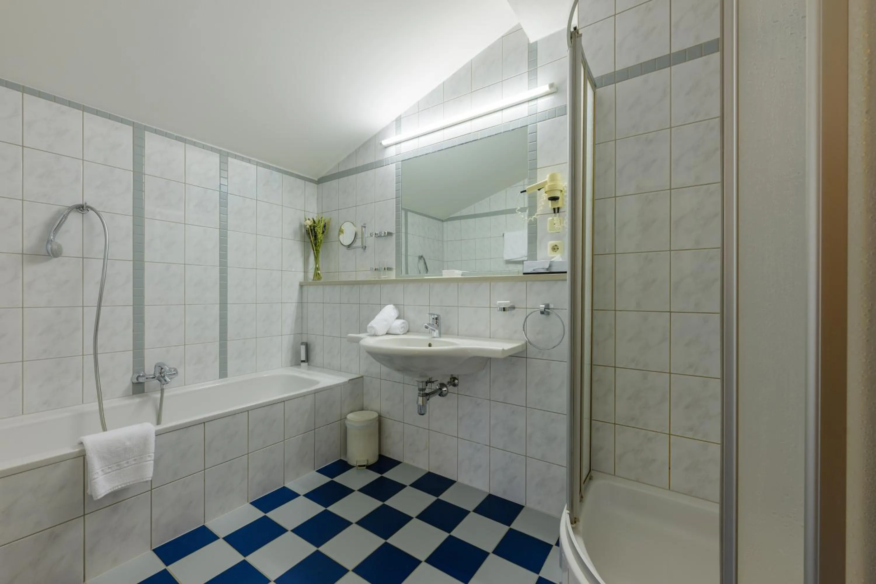 Bathroom in Landgasthof Bogner by SMK Event und Gastro